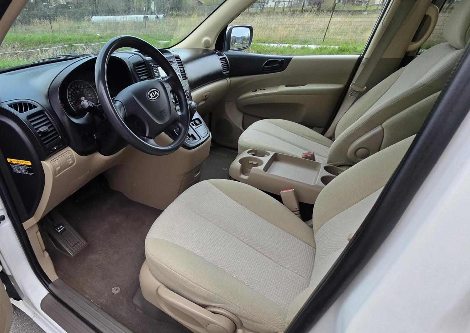 2010 White /Tan Kia Sedona Base SWB (KNDMG4C34A6) with an 3.8L V6 DOHC 24V engine, 5-Speed Automatic transmission, located at 450 N Russell, Missoula, MT, 59801, (406) 543-6600, 46.874496, -114.017433 - Clean 2 Owner FWD. 3.8L V6 Engine. Automatic Transmission. Rear Doors are Sliding for easy entrance. Front and Rear Climate Control. Air. Cruise. Tilt. Capable of third row seating but the rear seat is not there. AM FM CD Player. Clean Title and Carfax. - Photo#12