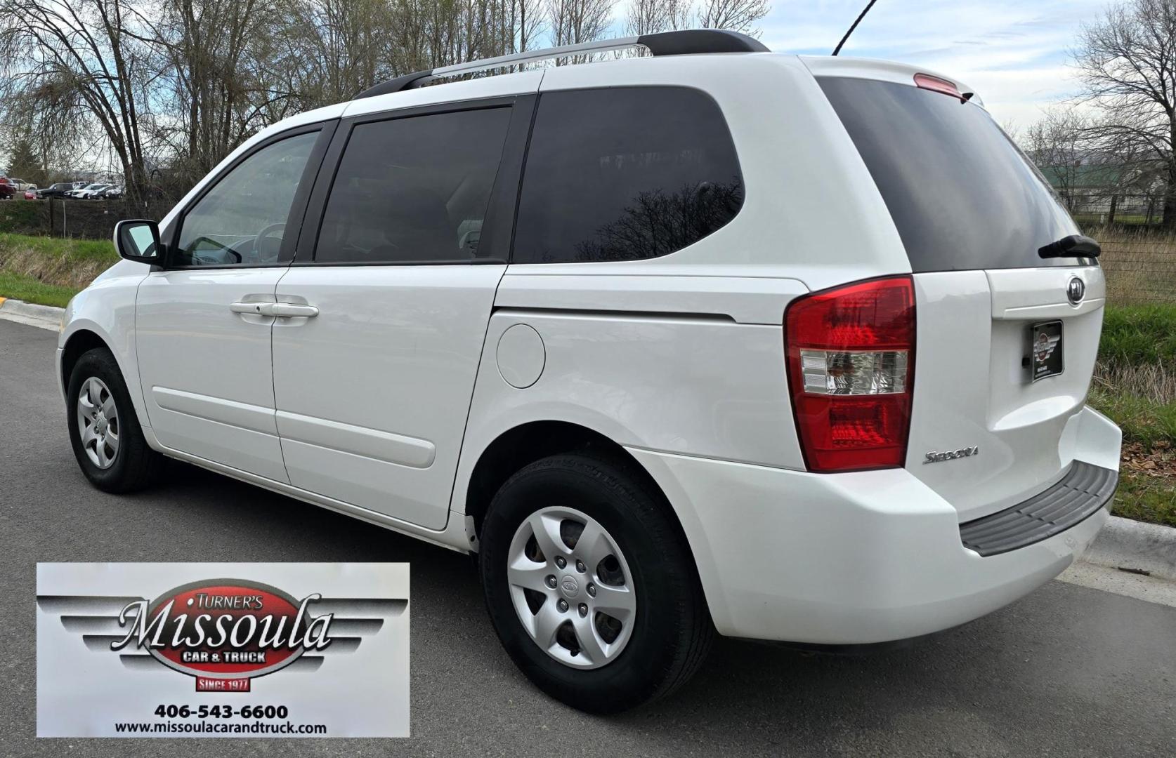 2010 White /Tan Kia Sedona Base SWB (KNDMG4C34A6) with an 3.8L V6 DOHC 24V engine, 5-Speed Automatic transmission, located at 450 N Russell, Missoula, MT, 59801, (406) 543-6600, 46.874496, -114.017433 - Clean 2 Owner FWD. 3.8L V6 Engine. Automatic Transmission. Rear Doors are Sliding for easy entrance. Front and Rear Climate Control. Air. Cruise. Tilt. Capable of third row seating but the rear seat is not there. AM FM CD Player. Clean Title and Carfax. - Photo#2