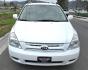 2010 White /Tan Kia Sedona Base SWB (KNDMG4C34A6) with an 3.8L V6 DOHC 24V engine, 5-Speed Automatic transmission, located at 450 N Russell, Missoula, MT, 59801, (406) 543-6600, 46.874496, -114.017433 - Clean 2 Owner FWD. 3.8L V6 Engine. Automatic Transmission. Rear Doors are Sliding for easy entrance. Front and Rear Climate Control. Air. Cruise. Tilt. Capable of third row seating but the rear seat is not there. AM FM CD Player. Clean Title and Carfax. - Photo#3