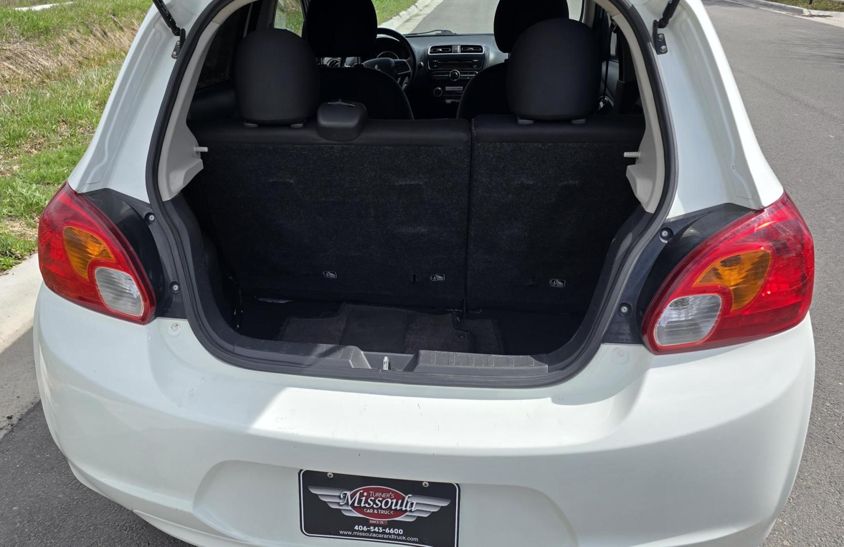 2014 White /Purple Mitsubishi Mirage ES (ML32A4HJ9EH) with an 1.2L L3 DOHC engine, 5 Speed Manual transmission, located at 450 N Russell, Missoula, MT, 59801, (406) 543-6600, 46.874496, -114.017433 - If you want to save on Gas, here is a car for you. 34 mpg City 42 mpg Highway. 1.2L I3 Engine. 5 Speed Manual Transmission. AM FM CD AUX Bluetooth. Air. Cruise. Clean Title and Carfax. - Photo#8