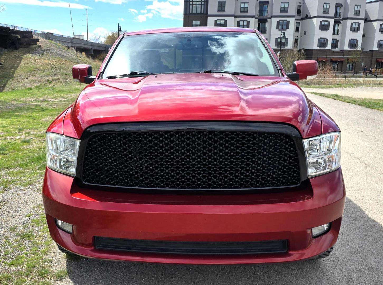 2010 Red /Gray Dodge Ram 1500 SLT Sport Quad Cab 4WD (1D7RV1GT1AS) with an 5.7L V8 OHV 16V engine, 5-Speed Automatic transmission, located at 450 N Russell, Missoula, MT, 59801, (406) 543-6600, 46.874496, -114.017433 - Beautiful Red 4WD Truck. 5.7L Hemi V8. Automatic Transmission. Air Cruise Tilt. Power Windows and Locks. Remote Start. Bluetooth Audio and Phone. Alpine Stereo System AM FM Sat CD Player with Harddrive. Navigation. Nice Aftermarket Wheels. Running Boards. Bed Liner. Has a couple small dents on passe - Photo#6