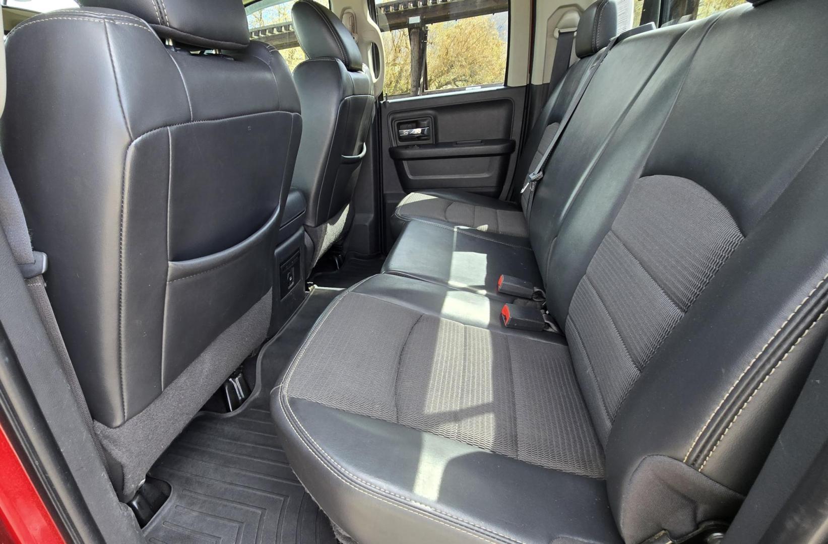 2010 Red /Gray Dodge Ram 1500 SLT Sport Quad Cab 4WD (1D7RV1GT1AS) with an 5.7L V8 OHV 16V engine, 5-Speed Automatic transmission, located at 450 N Russell, Missoula, MT, 59801, (406) 543-6600, 46.874496, -114.017433 - Beautiful Red 4WD Truck. 5.7L Hemi V8. Automatic Transmission. Air Cruise Tilt. Power Windows and Locks. Remote Start. Bluetooth Audio and Phone. Alpine Stereo System AM FM Sat CD Player with Harddrive. Navigation. Nice Aftermarket Wheels. Running Boards. Bed Liner. Has a couple small dents on passe - Photo#11