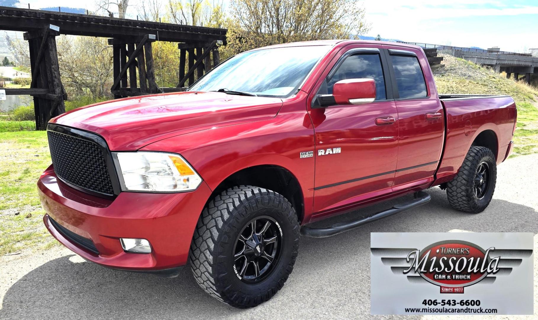 2010 Red /Gray Dodge Ram 1500 SLT Sport Quad Cab 4WD (1D7RV1GT1AS) with an 5.7L V8 OHV 16V engine, 5-Speed Automatic transmission, located at 450 N Russell, Missoula, MT, 59801, (406) 543-6600, 46.874496, -114.017433 - Beautiful Red 4WD Truck. 5.7L Hemi V8. Automatic Transmission. Air Cruise Tilt. Power Windows and Locks. Remote Start. Bluetooth Audio and Phone. Alpine Stereo System AM FM Sat CD Player with Harddrive. Navigation. Nice Aftermarket Wheels. Running Boards. Bed Liner. Has a couple small dents on passe - Photo#1