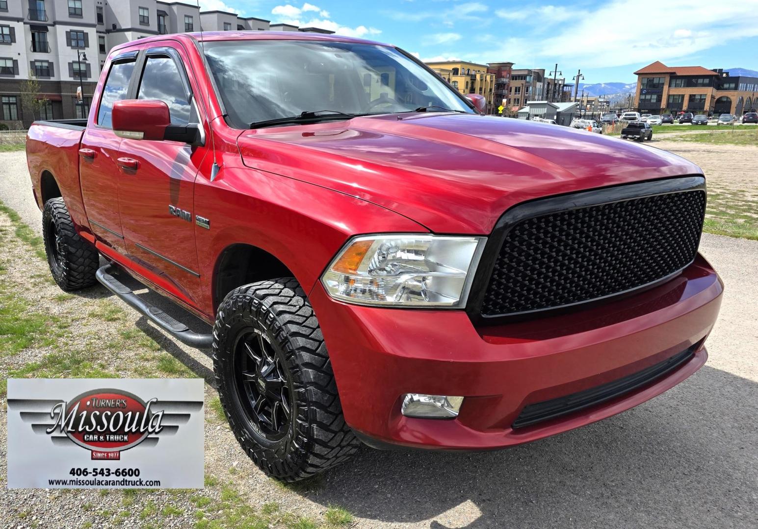2010 Red /Gray Dodge Ram 1500 SLT Sport Quad Cab 4WD (1D7RV1GT1AS) with an 5.7L V8 OHV 16V engine, 5-Speed Automatic transmission, located at 450 N Russell, Missoula, MT, 59801, (406) 543-6600, 46.874496, -114.017433 - Beautiful Red 4WD Truck. 5.7L Hemi V8. Automatic Transmission. Air Cruise Tilt. Power Windows and Locks. Remote Start. Bluetooth Audio and Phone. Alpine Stereo System AM FM Sat CD Player with Harddrive. Navigation. Nice Aftermarket Wheels. Running Boards. Bed Liner. Has a couple small dents on passe - Photo#2