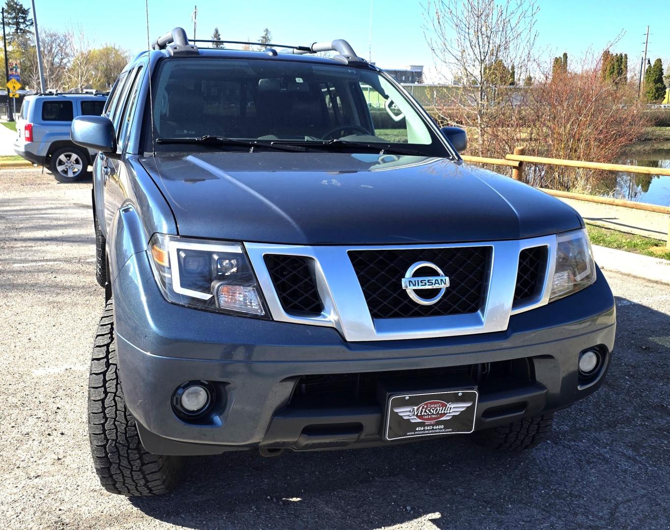 2014 Blue /Black Nissan Frontier Pro-4X Crew Cab 4WD (1N6AD0EV9EN) with an 4.0L V6 DOHC 24V engine, 5-Speed Automatic transmission, located at 450 N Russell, Missoula, MT, 59801, (406) 543-6600, 46.874496, -114.017433 - Hard to Find 4WD Truck in this size. 4.0L V6 Engine. Automatic Transmission. Matching Topper. Power Sunroof. Heated Power Seats. AM FM SAT Bluetooth. Backup Camera. Power Windows and Locks. Towing. Roof Rack. Clean Title and Carfax. - Photo#3