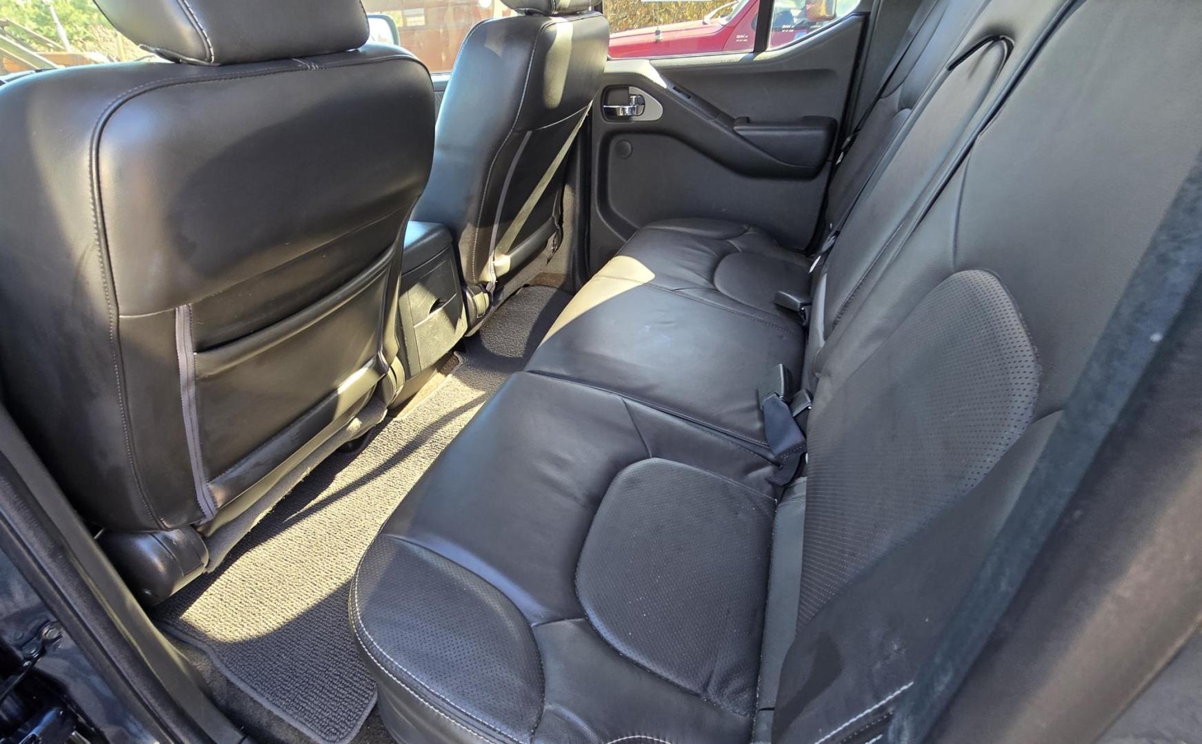 2014 Blue /Black Nissan Frontier Pro-4X Crew Cab 4WD (1N6AD0EV9EN) with an 4.0L V6 DOHC 24V engine, 5-Speed Automatic transmission, located at 450 N Russell, Missoula, MT, 59801, (406) 543-6600, 46.874496, -114.017433 - Hard to Find 4WD Truck in this size. 4.0L V6 Engine. Automatic Transmission. Matching Topper. Power Sunroof. Heated Power Seats. AM FM SAT Bluetooth. Backup Camera. Power Windows and Locks. Towing. Roof Rack. Clean Title and Carfax. - Photo#12