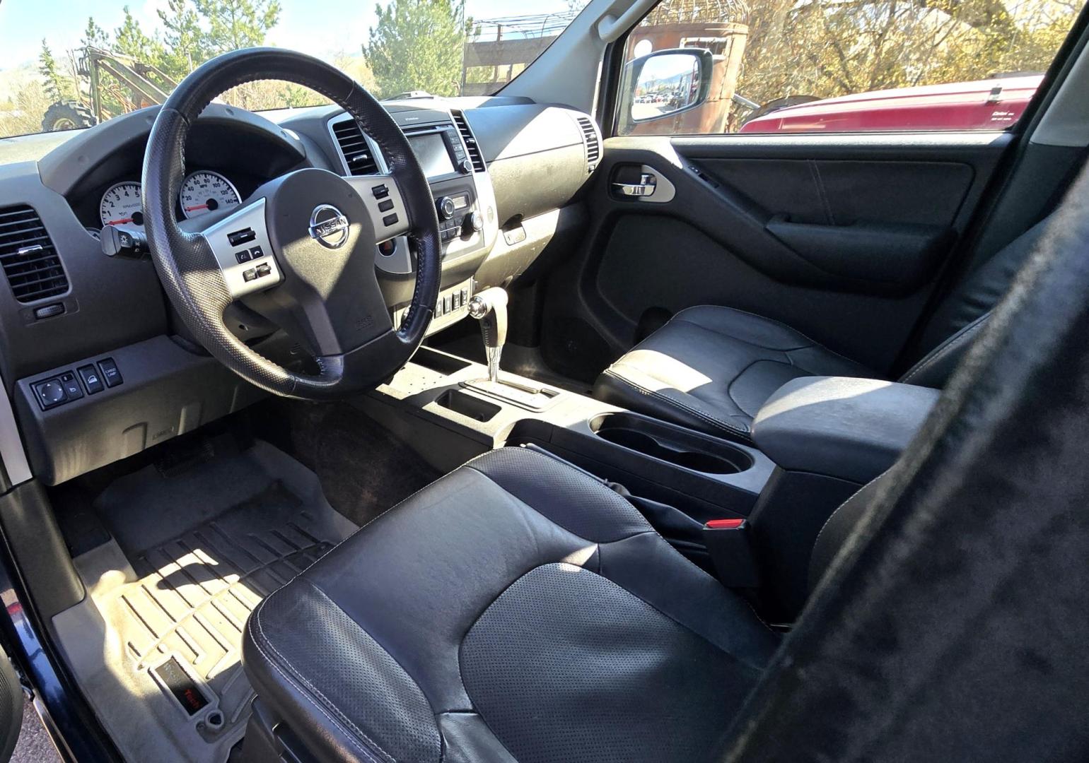 2014 Blue /Black Nissan Frontier Pro-4X Crew Cab 4WD (1N6AD0EV9EN) with an 4.0L V6 DOHC 24V engine, 5-Speed Automatic transmission, located at 450 N Russell, Missoula, MT, 59801, (406) 543-6600, 46.874496, -114.017433 - Hard to Find 4WD Truck in this size. 4.0L V6 Engine. Automatic Transmission. Matching Topper. Power Sunroof. Heated Power Seats. AM FM SAT Bluetooth. Backup Camera. Power Windows and Locks. Towing. Roof Rack. Clean Title and Carfax. - Photo#13