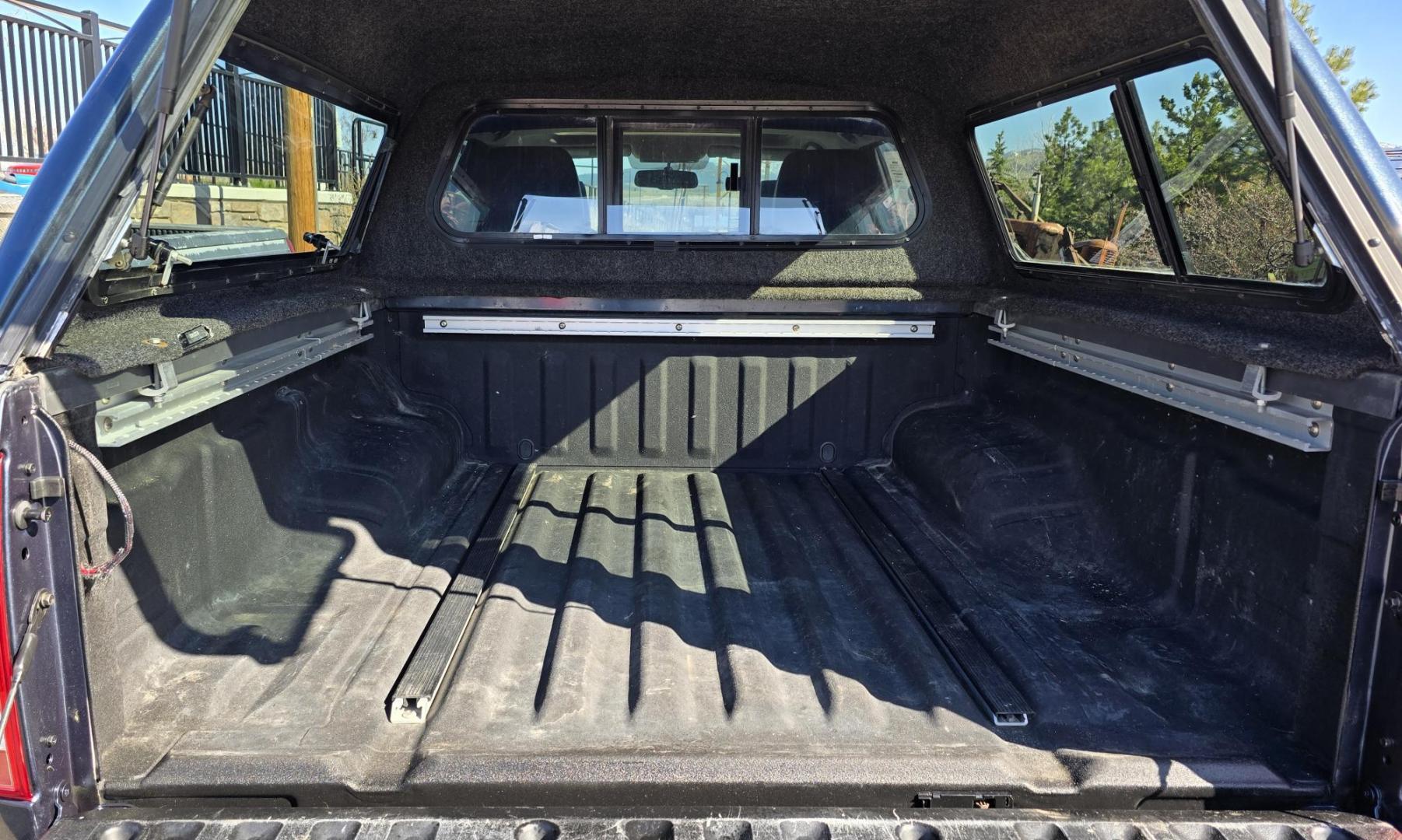 2014 Blue /Black Nissan Frontier Pro-4X Crew Cab 4WD (1N6AD0EV9EN) with an 4.0L V6 DOHC 24V engine, 5-Speed Automatic transmission, located at 450 N Russell, Missoula, MT, 59801, (406) 543-6600, 46.874496, -114.017433 - Hard to Find 4WD Truck in this size. 4.0L V6 Engine. Automatic Transmission. Matching Topper. Power Sunroof. Heated Power Seats. AM FM SAT Bluetooth. Backup Camera. Power Windows and Locks. Towing. Roof Rack. Clean Title and Carfax. - Photo#16