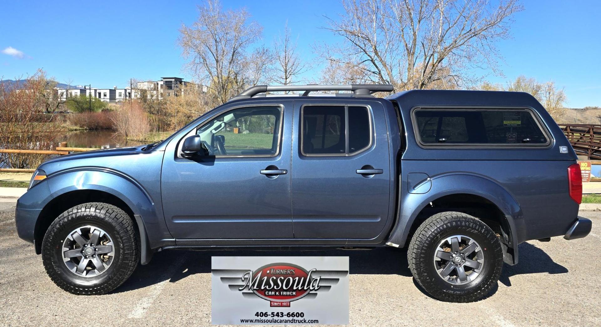 2014 Blue /Black Nissan Frontier Pro-4X Crew Cab 4WD (1N6AD0EV9EN) with an 4.0L V6 DOHC 24V engine, 5-Speed Automatic transmission, located at 450 N Russell, Missoula, MT, 59801, (406) 543-6600, 46.874496, -114.017433 - Hard to Find 4WD Truck in this size. 4.0L V6 Engine. Automatic Transmission. Matching Topper. Power Sunroof. Heated Power Seats. AM FM SAT Bluetooth. Backup Camera. Power Windows and Locks. Towing. Roof Rack. Clean Title and Carfax. - Photo#2