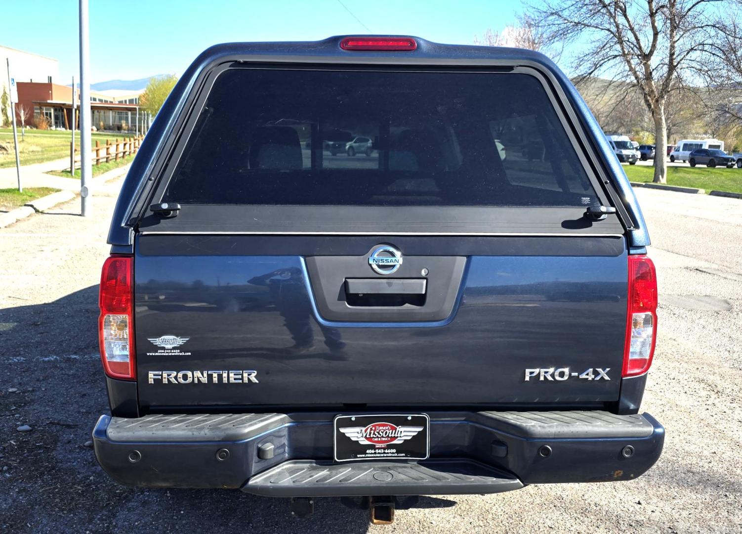 2014 Blue /Black Nissan Frontier Pro-4X Crew Cab 4WD (1N6AD0EV9EN) with an 4.0L V6 DOHC 24V engine, 5-Speed Automatic transmission, located at 450 N Russell, Missoula, MT, 59801, (406) 543-6600, 46.874496, -114.017433 - Hard to Find 4WD Truck in this size. 4.0L V6 Engine. Automatic Transmission. Matching Topper. Power Sunroof. Heated Power Seats. AM FM SAT Bluetooth. Backup Camera. Power Windows and Locks. Towing. Roof Rack. Clean Title and Carfax. - Photo#5