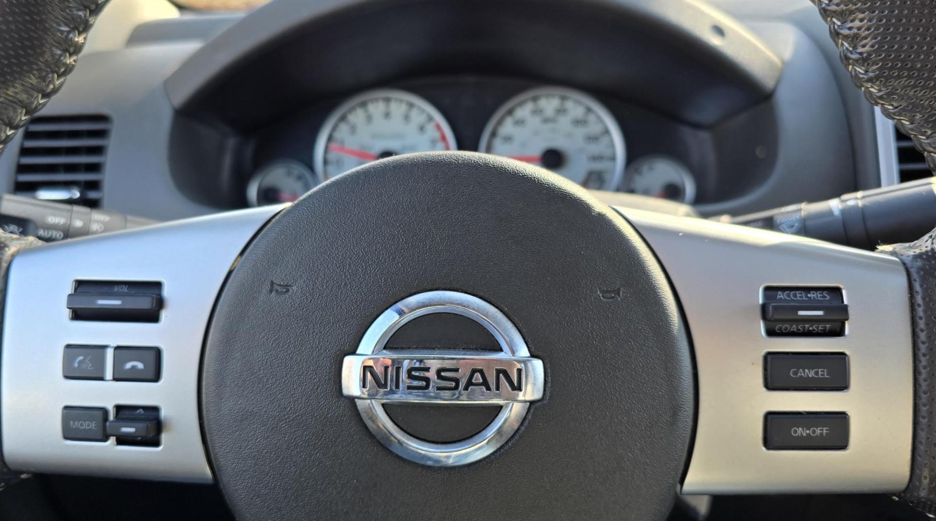 2014 Blue /Black Nissan Frontier Pro-4X Crew Cab 4WD (1N6AD0EV9EN) with an 4.0L V6 DOHC 24V engine, 5-Speed Automatic transmission, located at 450 N Russell, Missoula, MT, 59801, (406) 543-6600, 46.874496, -114.017433 - Hard to Find 4WD Truck in this size. 4.0L V6 Engine. Automatic Transmission. Matching Topper. Power Sunroof. Heated Power Seats. AM FM SAT Bluetooth. Backup Camera. Power Windows and Locks. Towing. Roof Rack. Clean Title and Carfax. - Photo#9