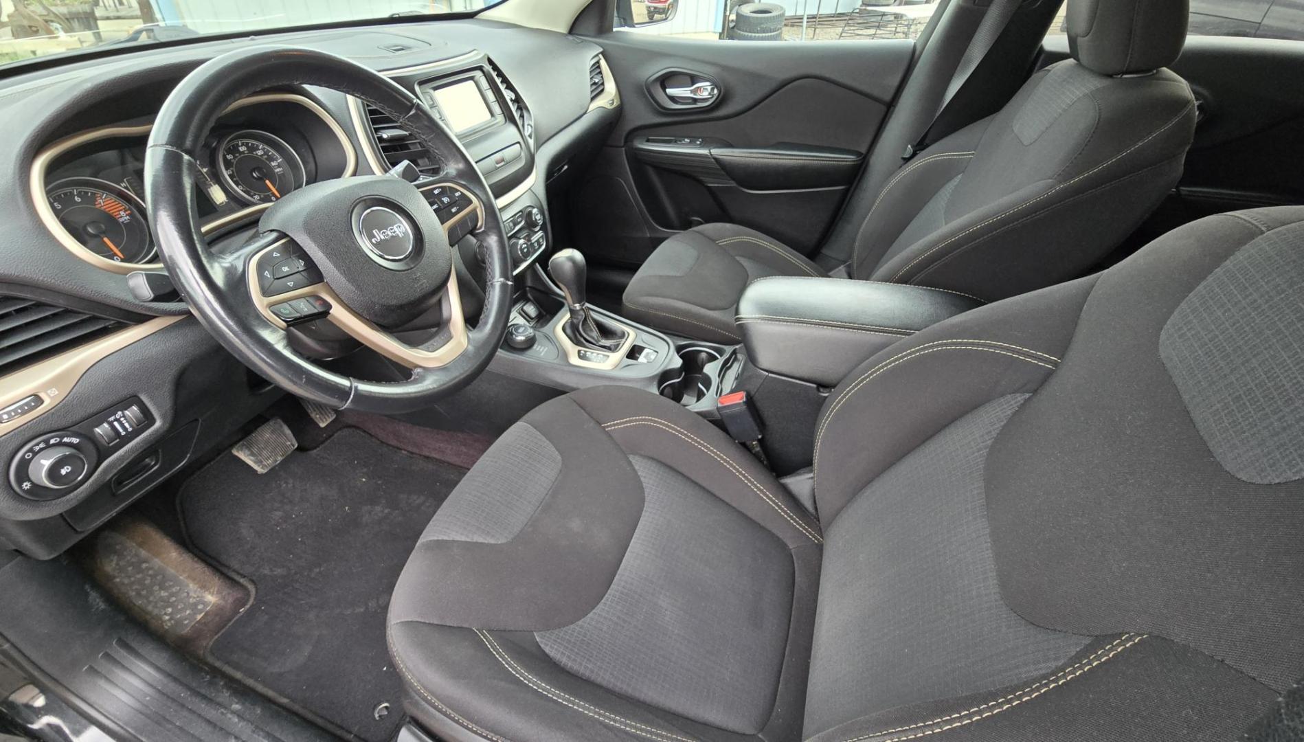 2016 Black /Black Jeep Cherokee Latitude 4WD (1C4PJMCS9GW) with an 3.2L V6 DOHC 24V engine, 9-Speed Automatic transmission, located at 450 N Russell, Missoula, MT, 59801, (406) 543-6600, 46.874496, -114.017433 - Black Jeep Cherokee Latitude 4WD. 3.2L V6 Engine. Air. Cruise. Tilt. Power Windows and Locks. Backup Camera. Bluetooth Audio and Phone. AM FM SAT. Passenger REar Door has a dent. - Photo#12