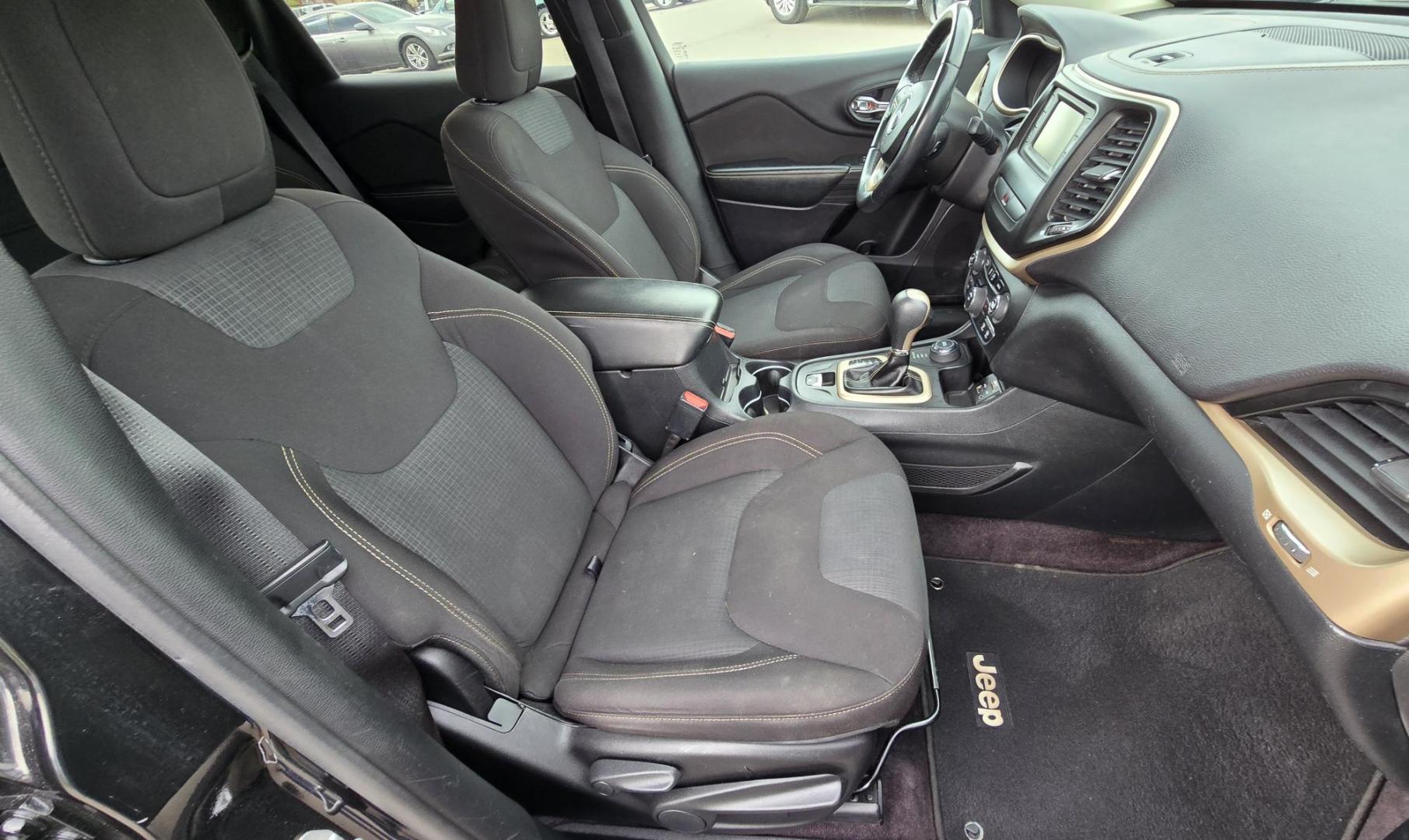 2016 Black /Black Jeep Cherokee Latitude 4WD (1C4PJMCS9GW) with an 3.2L V6 DOHC 24V engine, 9-Speed Automatic transmission, located at 450 N Russell, Missoula, MT, 59801, (406) 543-6600, 46.874496, -114.017433 - Black Jeep Cherokee Latitude 4WD. 3.2L V6 Engine. Air. Cruise. Tilt. Power Windows and Locks. Backup Camera. Bluetooth Audio and Phone. AM FM SAT. Passenger REar Door has a dent. - Photo#16