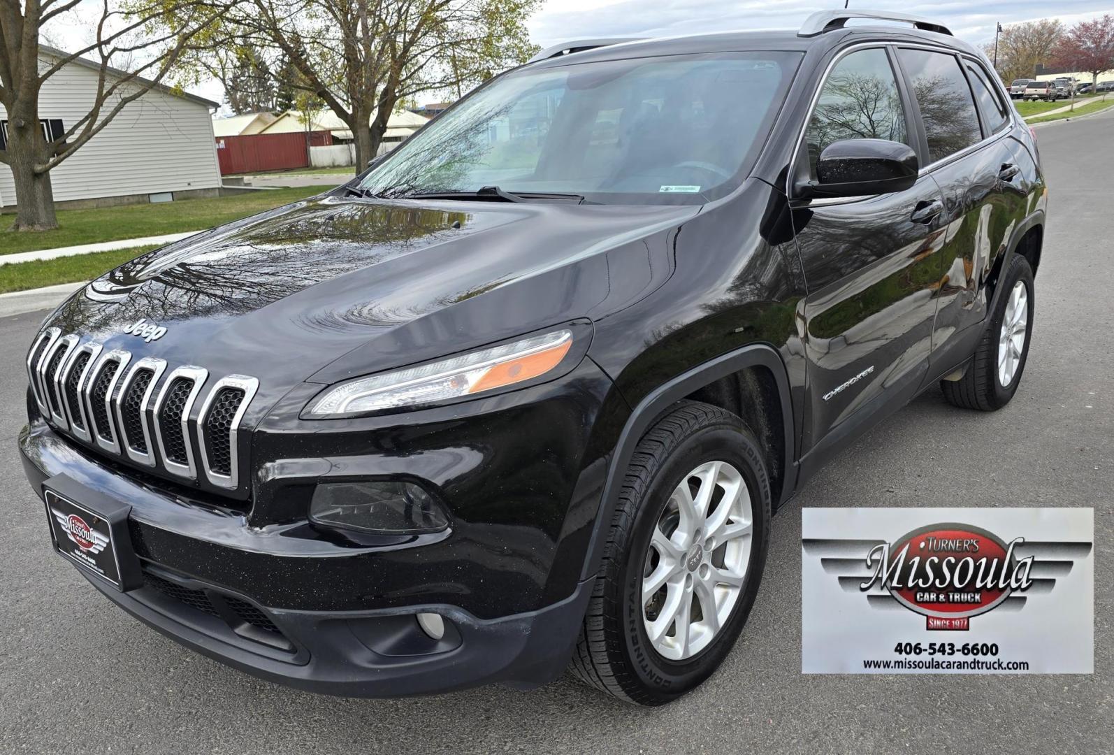 2016 Black /Black Jeep Cherokee Latitude 4WD (1C4PJMCS9GW) with an 3.2L V6 DOHC 24V engine, 9-Speed Automatic transmission, located at 450 N Russell, Missoula, MT, 59801, (406) 543-6600, 46.874496, -114.017433 - Black Jeep Cherokee Latitude 4WD. 3.2L V6 Engine. Air. Cruise. Tilt. Power Windows and Locks. Backup Camera. Bluetooth Audio and Phone. AM FM SAT. Passenger REar Door has a dent. - Photo#4