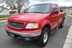 2000 Red /Tan Ford F-150 Lariat SuperCab 4WD (1FTRX18L1YN) with an 5.4L V8 SOHC 16V engine, 4-Speed Automatic Overdrive transmission, located at 450 N Russell, Missoula, MT, 59801, (406) 543-6600, 46.874496, -114.017433 - Strong Running 4WD Truck. 5.4L V8 Engine. Automatic Transmission. 4 Doors. Air. Cruise. Tilt. Power Windows and Locks. Aftermarket AM FM CD Player. Bedliner. Running Boards. Because of the age, financing is not available through our lenders. - Photo#4
