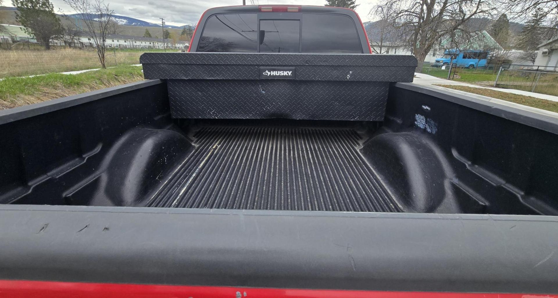 2000 Red /Tan Ford F-150 Lariat SuperCab 4WD (1FTRX18L1YN) with an 5.4L V8 SOHC 16V engine, 4-Speed Automatic Overdrive transmission, located at 450 N Russell, Missoula, MT, 59801, (406) 543-6600, 46.874496, -114.017433 - Strong Running 4WD Truck. 5.4L V8 Engine. Automatic Transmission. 4 Doors. Air. Cruise. Tilt. Power Windows and Locks. Aftermarket AM FM CD Player. Bedliner. Running Boards. Because of the age, financing is not available through our lenders. - Photo#6