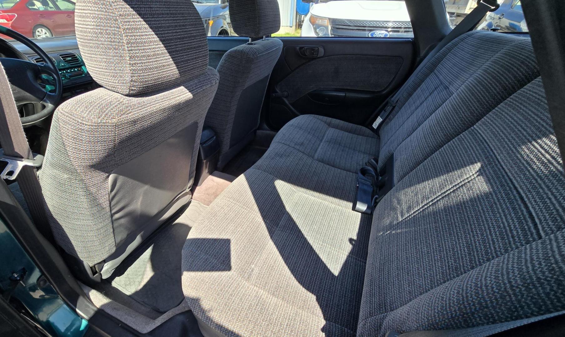 1998 Green /Gray Subaru Legacy Wagon Brighton AWD (4S3BK4259W6) with an 2.2L H4 SOHC 16V engine, 5-Speed Manual Overdrive transmission, located at 450 N Russell, Missoula, MT, 59801, (406) 543-6600, 46.874496, -114.017433 - Hard to find Low Mile AWD Subaru Brighton. Only 106K Miles. 2.2L H4 Engine. 5 Speed Manual Transmission. Air. Cruise. Tilt. AM FM Cassette. Has a little rust but overall good condition. Clean Carfax and Title. Because of the age of this vehicle. Financing is ntt available through our lenders. - Photo#9