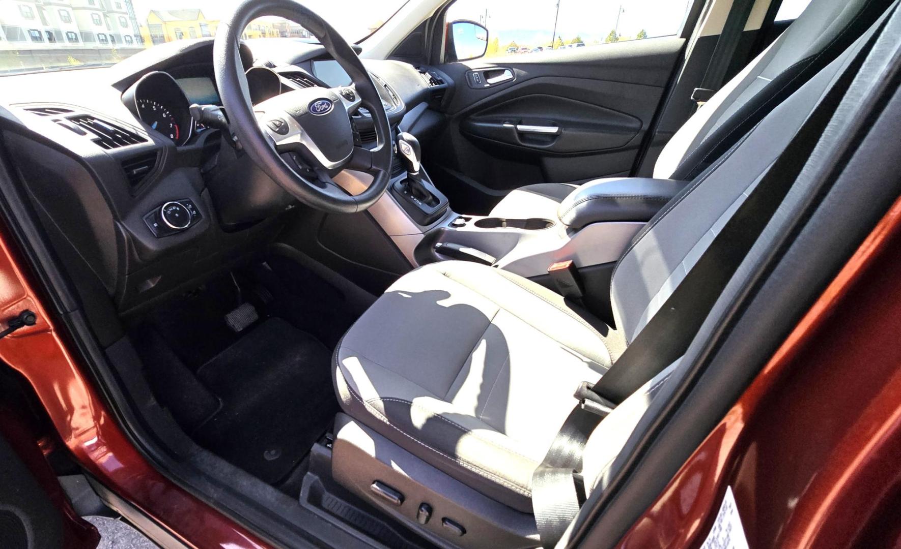 2014 Orange /Gray Ford Escape SE 4WD (1FMCU9G94EU) with an 2.0L L4 DOHC 16V engine, 6-Speed Automatic transmission, located at 450 N Russell, Missoula, MT, 59801, (406) 543-6600, 46.874496, -114.017433 - Beautiful Ford Escape. AWD. Official Color is Sunset Metallic. 2.0L I4 Engine. Automatic Transmission. Air. Cruise. Tilt. Bluetooth Audio and Phone. Backup Camera. Power Windows and Locks. AM FM SAT CD Player. Roof Rack. Towing. - Photo#13
