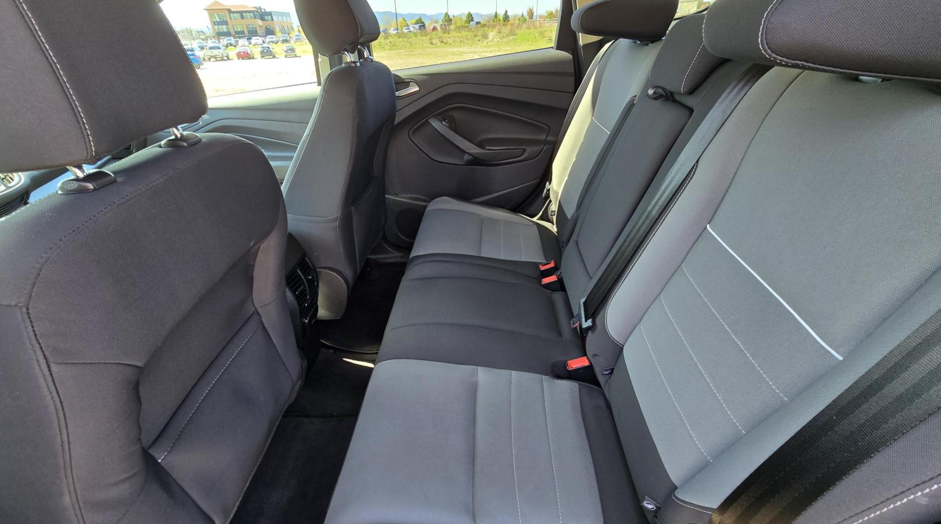 2014 Orange /Gray Ford Escape SE 4WD (1FMCU9G94EU) with an 2.0L L4 DOHC 16V engine, 6-Speed Automatic transmission, located at 450 N Russell, Missoula, MT, 59801, (406) 543-6600, 46.874496, -114.017433 - Beautiful Ford Escape. AWD. Official Color is Sunset Metallic. 2.0L I4 Engine. Automatic Transmission. Air. Cruise. Tilt. Bluetooth Audio and Phone. Backup Camera. Power Windows and Locks. AM FM SAT CD Player. Roof Rack. Towing. - Photo#14