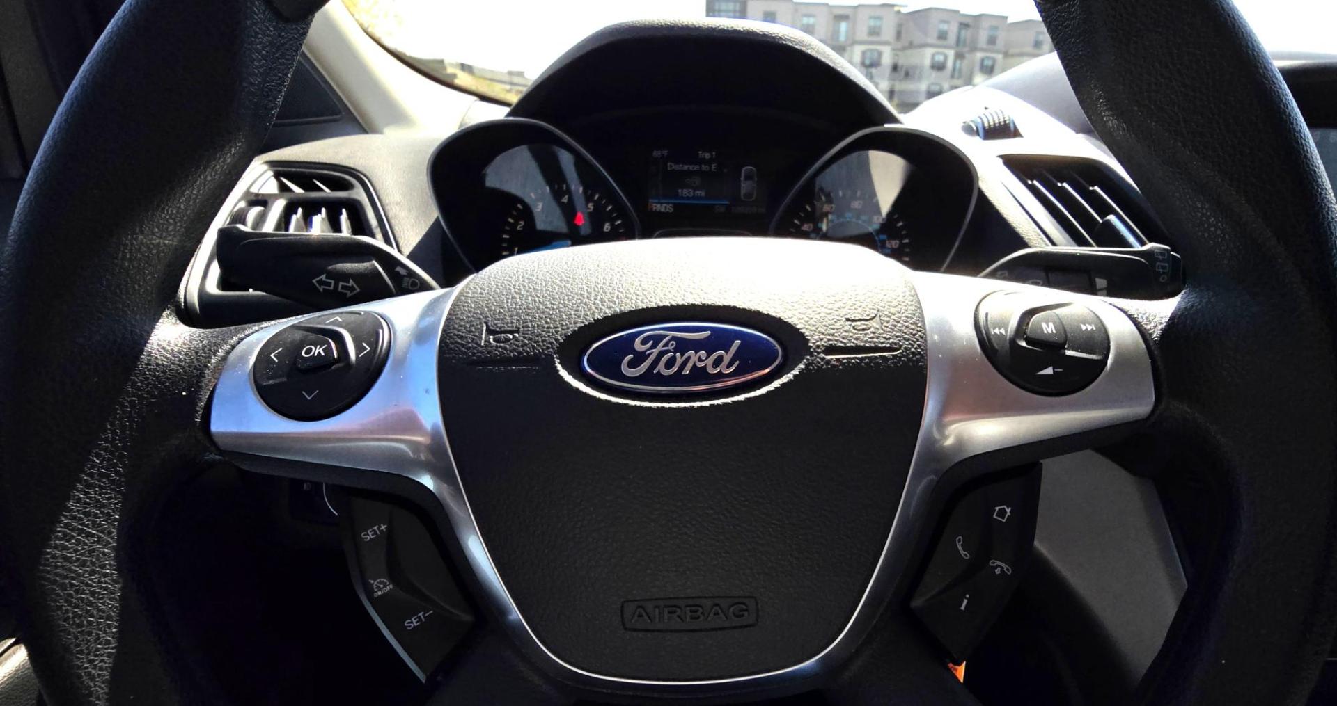 2014 Orange /Gray Ford Escape SE 4WD (1FMCU9G94EU) with an 2.0L L4 DOHC 16V engine, 6-Speed Automatic transmission, located at 450 N Russell, Missoula, MT, 59801, (406) 543-6600, 46.874496, -114.017433 - Beautiful Ford Escape. AWD. Official Color is Sunset Metallic. 2.0L I4 Engine. Automatic Transmission. Air. Cruise. Tilt. Bluetooth Audio and Phone. Backup Camera. Power Windows and Locks. AM FM SAT CD Player. Roof Rack. Towing. - Photo#16