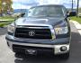 2010 Blue /Black Toyota Tundra Tundra-Grade Double Cab 4.6L 4WD (5TFUM5F14AX) with an 4.6L V8 DOHC 32V engine, 5-Speed Aut transmission, located at 450 N Russell, Missoula, MT, 59801, (406) 543-6600, 46.874496, -114.017433 - Nice Toyota Tundra. 4.6L V8 Engine. Automatic Transmission. Air. Cruise. Tilt. Power Windows and Locks. AM FM CD. Bluetooth Audio and Phone. Running Boards. Bedliner Great running and driving truck - Photo#3
