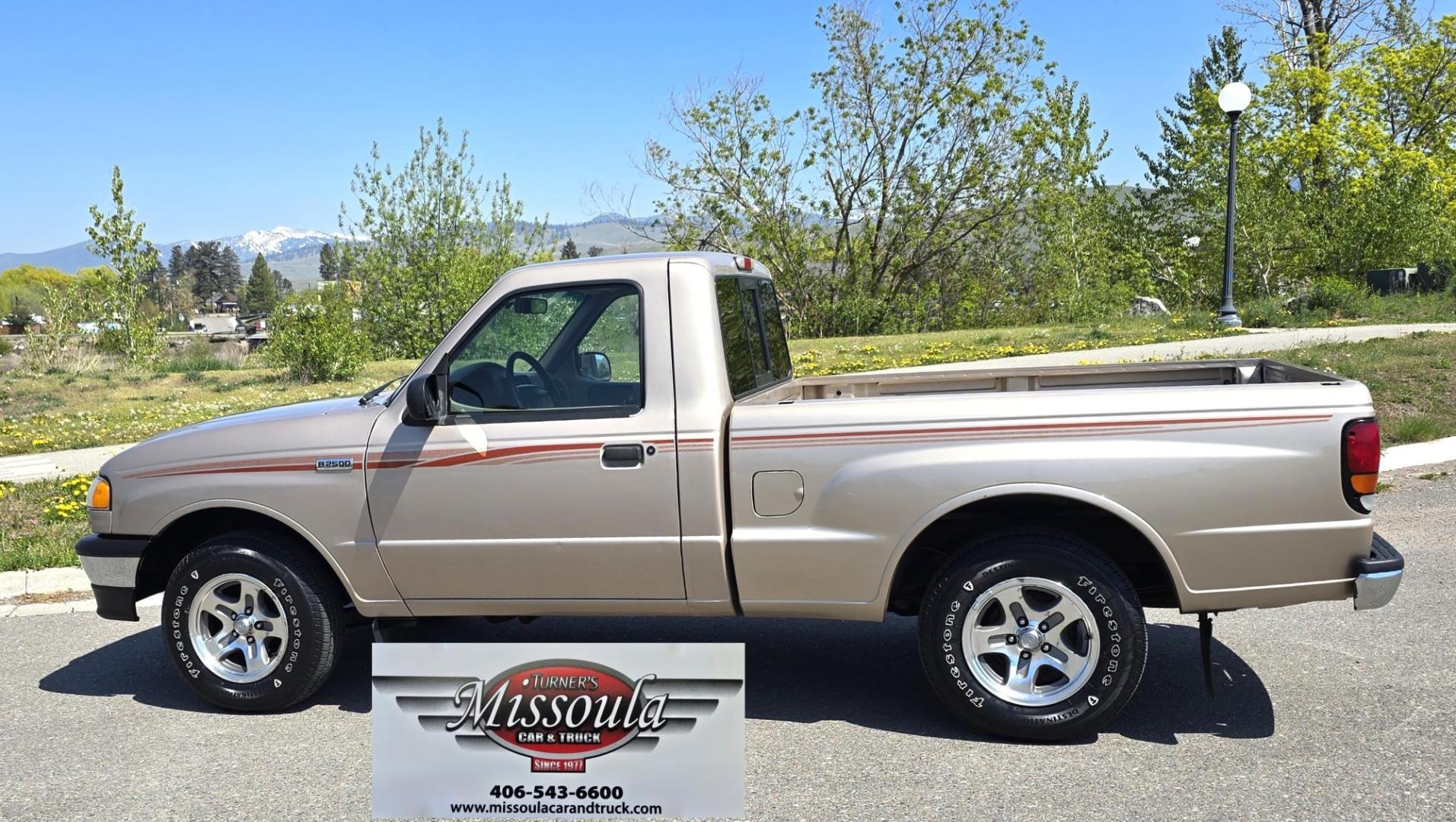 1998 Gold /Gray Mazda B-Series B2500 Reg. Cab SE 2WD (4F4YR12C4WT) with an 2.5L L4 SOHC 8V engine, 5 Speed Manual transmission, located at 450 N Russell, Missoula, MT, 59801, (406) 543-6600, 46.874496, -114.017433 - Pristine 98 Mazda B2500 2WD Pickup. Only 75,000 Miles. These are Ford Rangers made for Mazda. 2.5L I4 Engine. 5 Speed Manual Transmission. Air Conditioning. AM FM Cassette. Because of the age of this vehicle, financing is not available from our lenders. - Photo#2