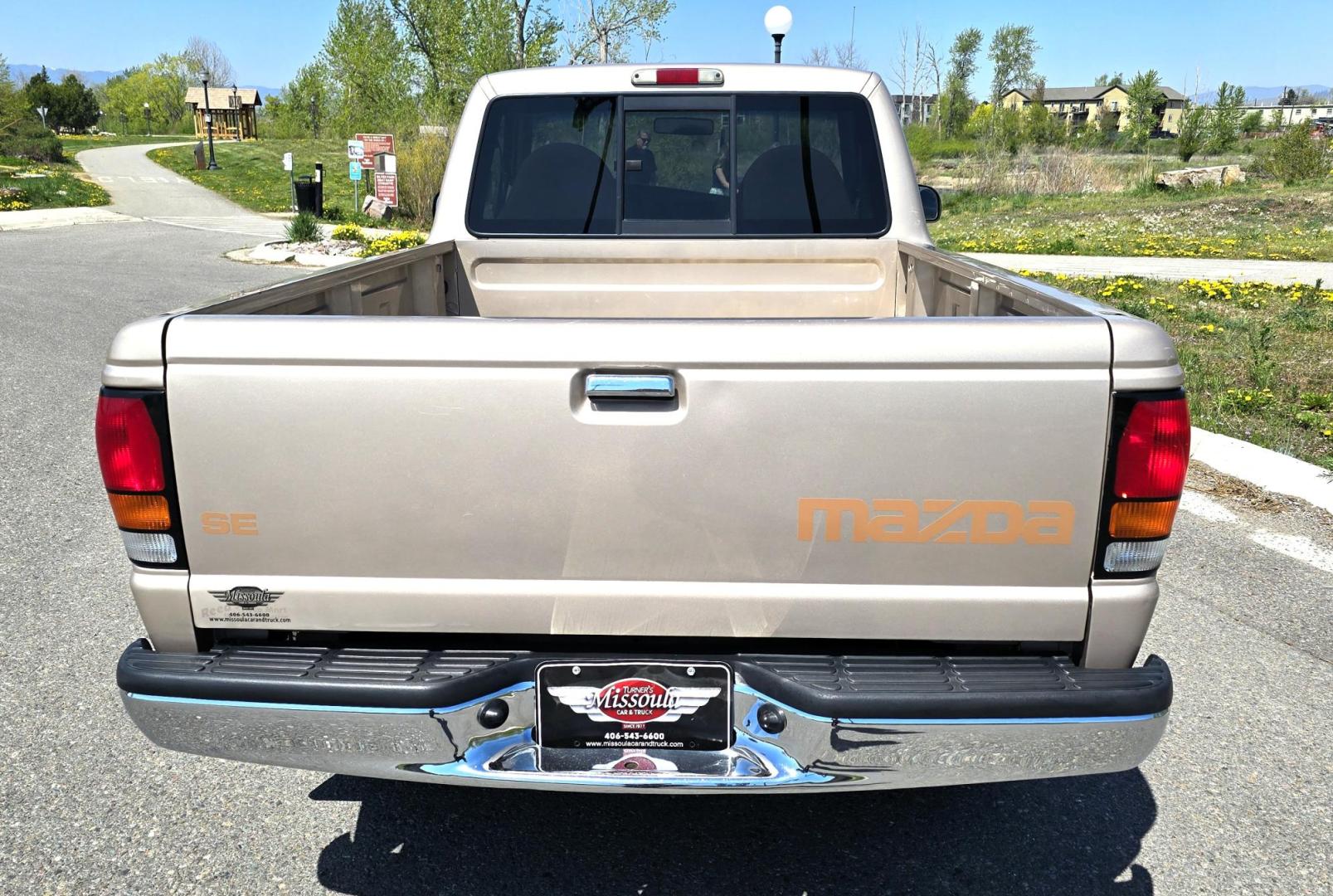 1998 Gold /Gray Mazda B-Series B2500 Reg. Cab SE 2WD (4F4YR12C4WT) with an 2.5L L4 SOHC 8V engine, 5 Speed Manual transmission, located at 450 N Russell, Missoula, MT, 59801, (406) 543-6600, 46.874496, -114.017433 - Pristine 98 Mazda B2500 2WD Pickup. Only 75,000 Miles. These are Ford Rangers made for Mazda. 2.5L I4 Engine. 5 Speed Manual Transmission. Air Conditioning. AM FM Cassette. Because of the age of this vehicle, financing is not available from our lenders. - Photo#6