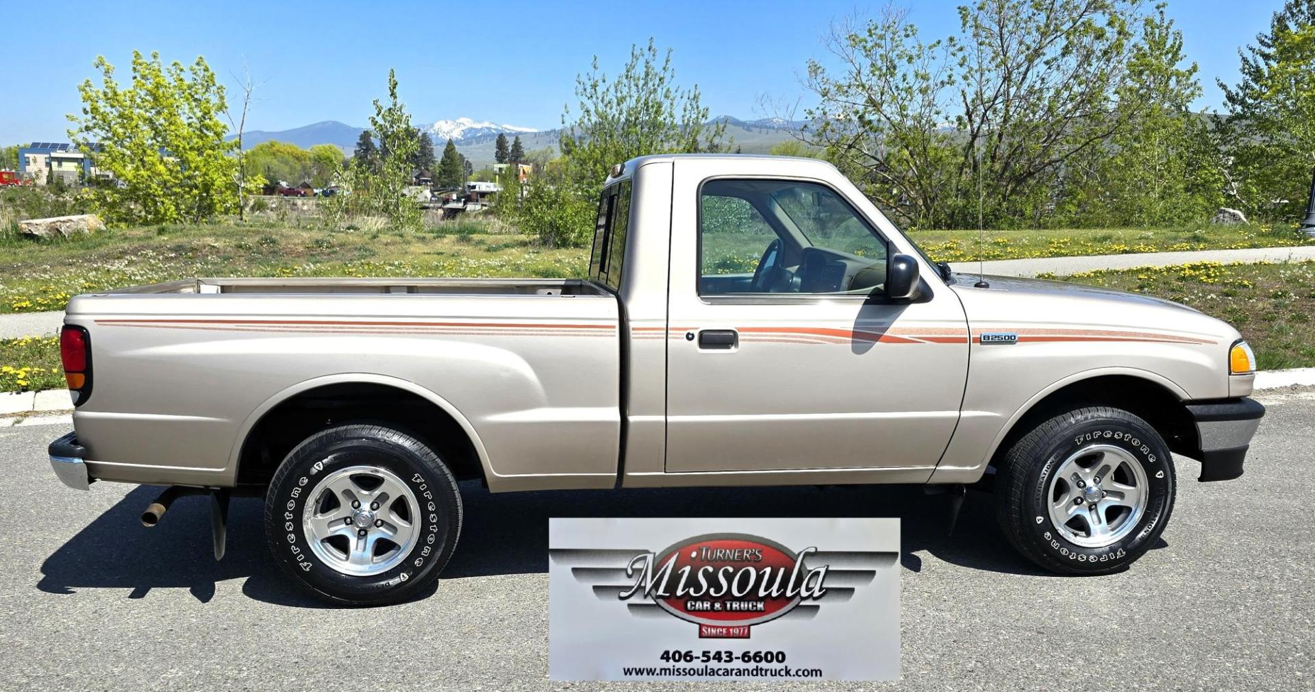 1998 Gold /Gray Mazda B-Series B2500 Reg. Cab SE 2WD (4F4YR12C4WT) with an 2.5L L4 SOHC 8V engine, 5 Speed Manual transmission, located at 450 N Russell, Missoula, MT, 59801, (406) 543-6600, 46.874496, -114.017433 - Pristine 98 Mazda B2500 2WD Pickup. Only 75,000 Miles. These are Ford Rangers made for Mazda. 2.5L I4 Engine. 5 Speed Manual Transmission. Air Conditioning. AM FM Cassette. Because of the age of this vehicle, financing is not available from our lenders. - Photo#1