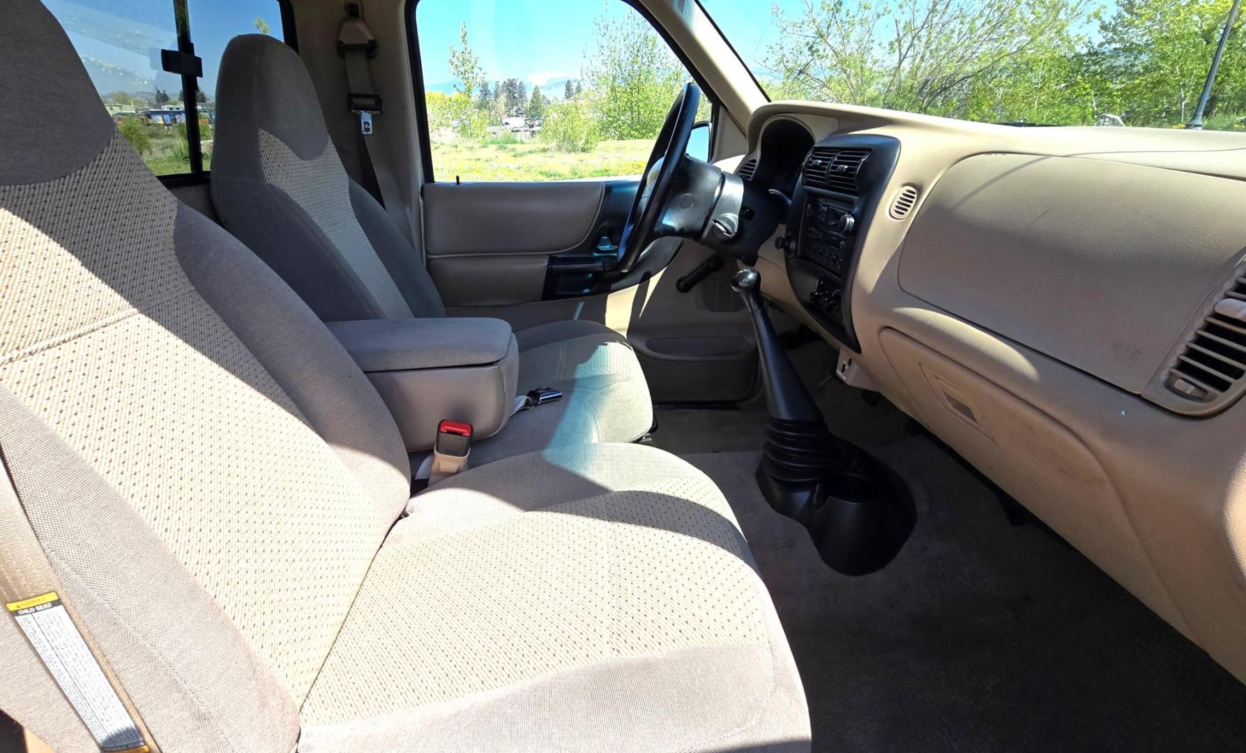 1998 Gold /Gray Mazda B-Series B2500 Reg. Cab SE 2WD (4F4YR12C4WT) with an 2.5L L4 SOHC 8V engine, 5 Speed Manual transmission, located at 450 N Russell, Missoula, MT, 59801, (406) 543-6600, 46.874496, -114.017433 - Pristine 98 Mazda B2500 2WD Pickup. Only 75,000 Miles. These are Ford Rangers made for Mazda. 2.5L I4 Engine. 5 Speed Manual Transmission. Air Conditioning. AM FM Cassette. Because of the age of this vehicle, financing is not available from our lenders. - Photo#9