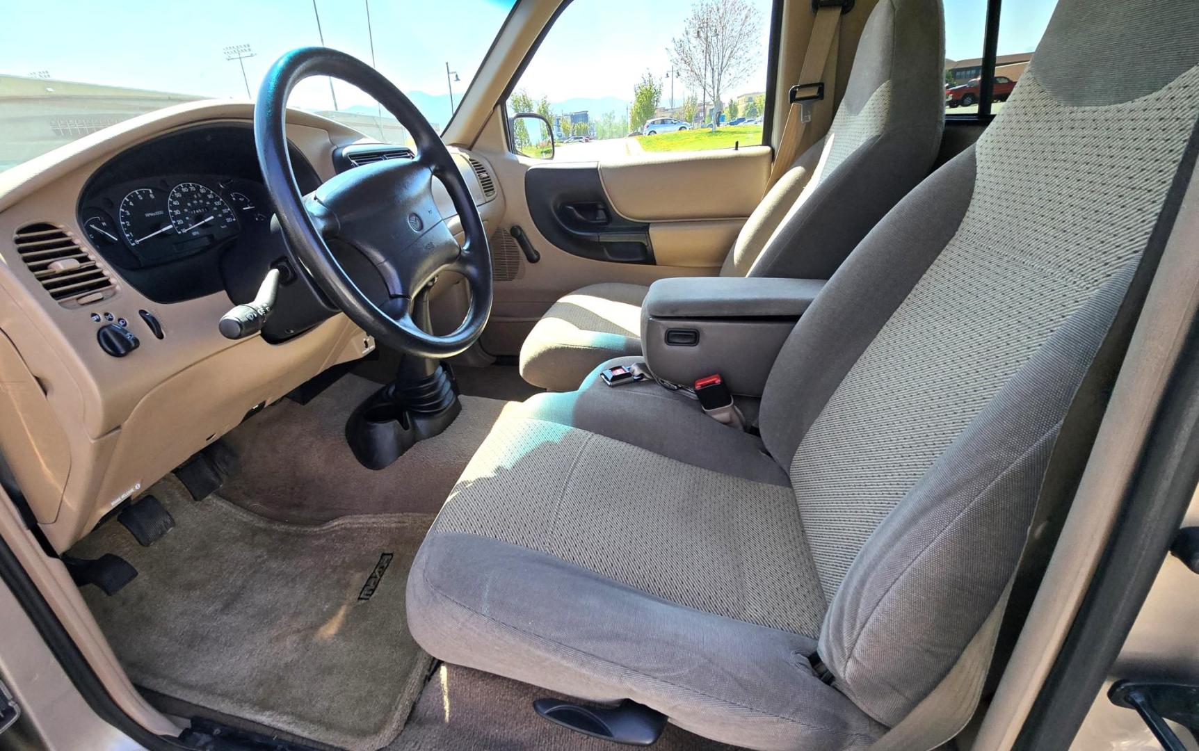 1998 Gold /Gray Mazda B-Series B2500 Reg. Cab SE 2WD (4F4YR12C4WT) with an 2.5L L4 SOHC 8V engine, 5 Speed Manual transmission, located at 450 N Russell, Missoula, MT, 59801, (406) 543-6600, 46.874496, -114.017433 - Pristine 98 Mazda B2500 2WD Pickup. Only 75,000 Miles. These are Ford Rangers made for Mazda. 2.5L I4 Engine. 5 Speed Manual Transmission. Air Conditioning. AM FM Cassette. Because of the age of this vehicle, financing is not available from our lenders. - Photo#10