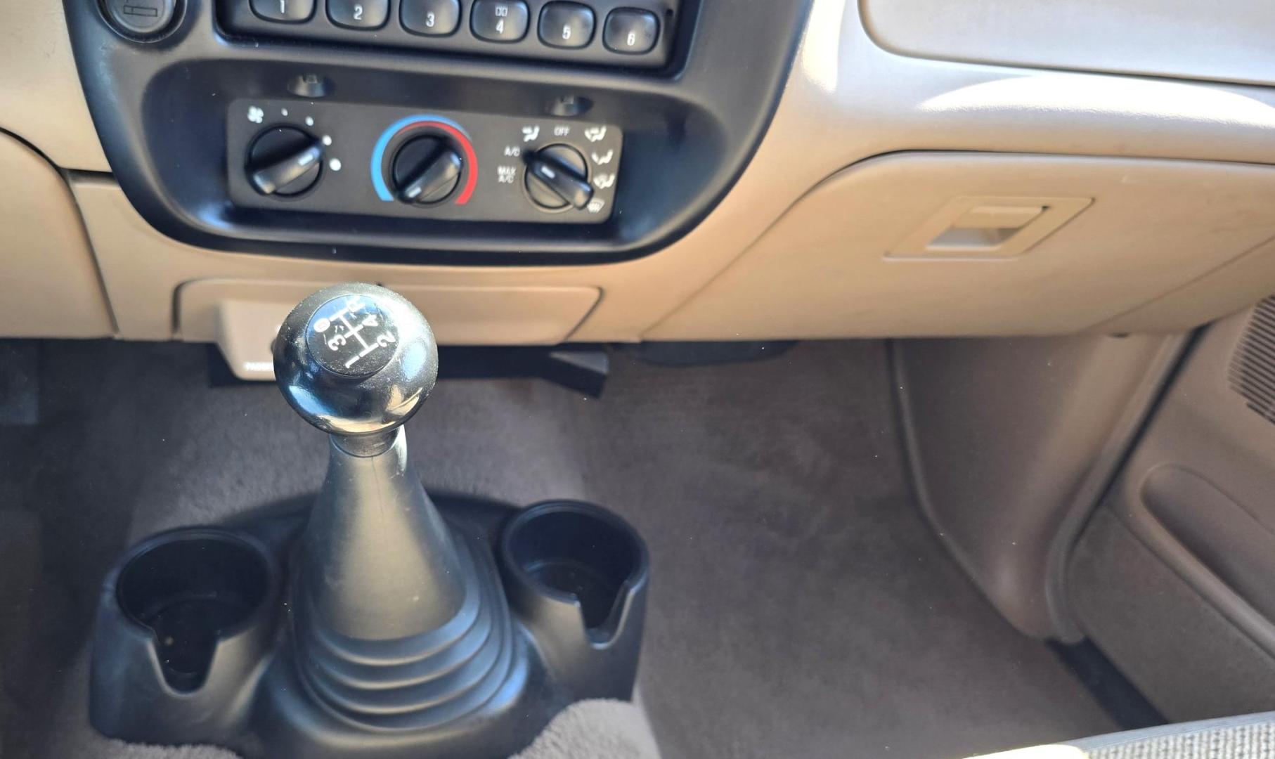 1998 Gold /Gray Mazda B-Series B2500 Reg. Cab SE 2WD (4F4YR12C4WT) with an 2.5L L4 SOHC 8V engine, 5 Speed Manual transmission, located at 450 N Russell, Missoula, MT, 59801, (406) 543-6600, 46.874496, -114.017433 - Pristine 98 Mazda B2500 2WD Pickup. Only 75,000 Miles. These are Ford Rangers made for Mazda. 2.5L I4 Engine. 5 Speed Manual Transmission. Air Conditioning. AM FM Cassette. Because of the age of this vehicle, financing is not available from our lenders. - Photo#12