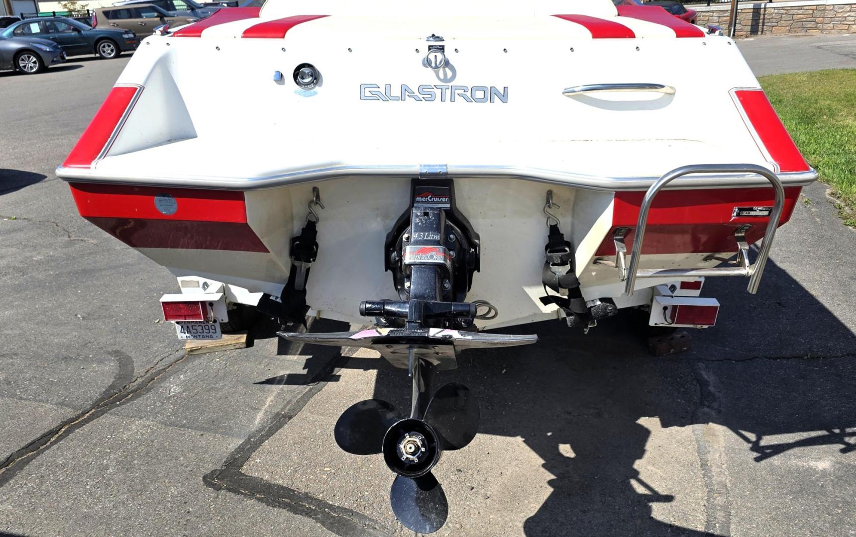 1992 Red /Red Glastron G1700 G1700 with an MerCruiser 4.3L V6 engine, located at 450 N Russell, Missoula, MT, 59801, (406) 543-6600, 46.874496, -114.017433 - You will be hard pressed to find another used Boat in this Condition. Pristine. Paint is near perfect. Upholstery is Excellent. Boat has been stored under two covers. Motor is a 4.3L V6 MerCruiser that runs well. EZ Load Trailer is also in great condition. Financing is Not Available through our - Photo#2