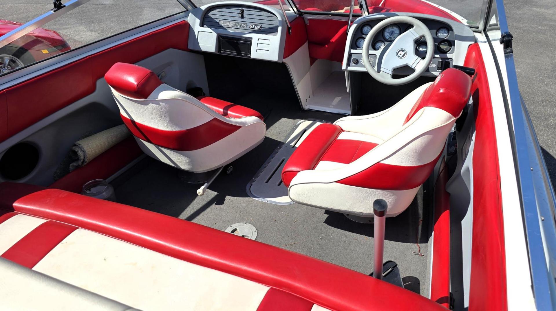 1992 Red /Red Glastron G1700 G1700 with an MerCruiser 4.3L V6 engine, located at 450 N Russell, Missoula, MT, 59801, (406) 543-6600, 46.874496, -114.017433 - You will be hard pressed to find another used Boat in this Condition. Pristine. Paint is near perfect. Upholstery is Excellent. Boat has been stored under two covers. Motor is a 4.3L V6 MerCruiser that runs well. EZ Load Trailer is also in great condition. Financing is Not Available through our - Photo#6