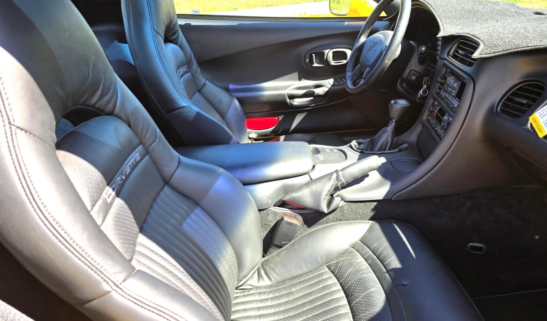 2003 Yellow /Black Chevrolet Corvette Coupe (1G1YY22G935) with an 5.7L V8 OHV 16V engine, 6 Speed Manual transmission, located at 450 N Russell, Missoula, MT, 59801, (406) 543-6600, 46.874496, -114.017433 - You read that right. Only 1,862 Miles. Barn Find in MINT Condition. Removable Glass Top. 6 Speed Manual Transmission. 5.7L V8 Engine. Leather Interior. Original buyer put a dash mat on when he bought it new to protect it, so the dash is perfect. Air. Cruise. Tilt. Power Windows and Locks. Power Memo - Photo#10