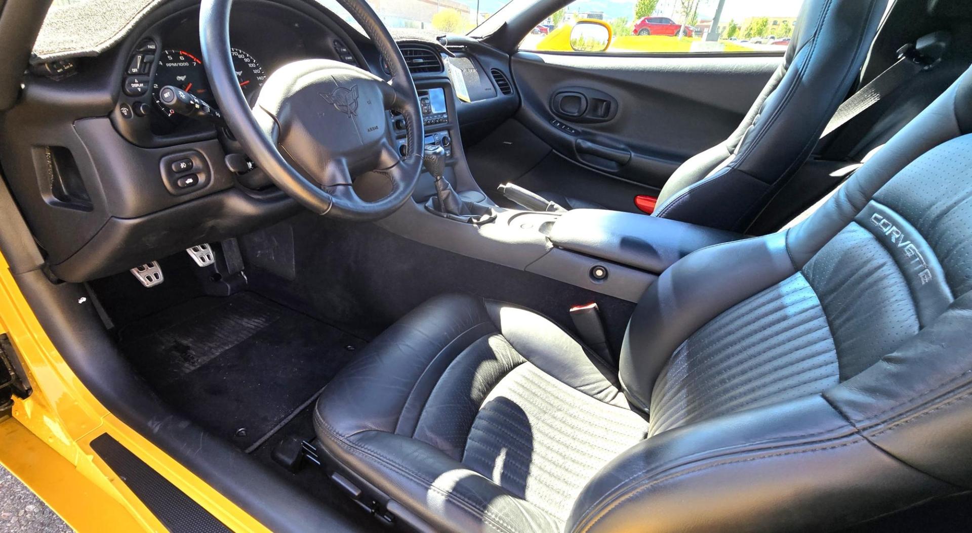 2003 Yellow /Black Chevrolet Corvette Coupe (1G1YY22G935) with an 5.7L V8 OHV 16V engine, 6 Speed Manual transmission, located at 450 N Russell, Missoula, MT, 59801, (406) 543-6600, 46.874496, -114.017433 - You read that right. Only 1,862 Miles. Barn Find in MINT Condition. Removable Glass Top. 6 Speed Manual Transmission. 5.7L V8 Engine. Leather Interior. Original buyer put a dash mat on when he bought it new to protect it, so the dash is perfect. Air. Cruise. Tilt. Power Windows and Locks. Power Memo - Photo#14