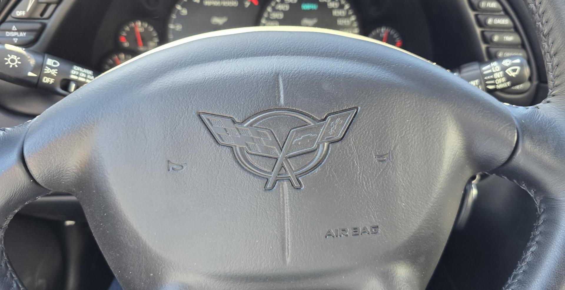 2003 Yellow /Black Chevrolet Corvette Coupe (1G1YY22G935) with an 5.7L V8 OHV 16V engine, 6 Speed Manual transmission, located at 450 N Russell, Missoula, MT, 59801, (406) 543-6600, 46.874496, -114.017433 - You read that right. Only 1,862 Miles. Barn Find in MINT Condition. Removable Glass Top. 6 Speed Manual Transmission. 5.7L V8 Engine. Leather Interior. Original buyer put a dash mat on when he bought it new to protect it, so the dash is perfect. Air. Cruise. Tilt. Power Windows and Locks. Power Memo - Photo#18