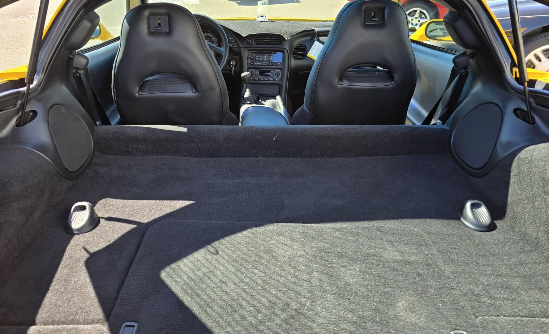 2003 Yellow /Black Chevrolet Corvette Coupe (1G1YY22G935) with an 5.7L V8 OHV 16V engine, 6 Speed Manual transmission, located at 450 N Russell, Missoula, MT, 59801, (406) 543-6600, 46.874496, -114.017433 - You read that right. Only 1,862 Miles. Barn Find in MINT Condition. Removable Glass Top. 6 Speed Manual Transmission. 5.7L V8 Engine. Leather Interior. Original buyer put a dash mat on when he bought it new to protect it, so the dash is perfect. Air. Cruise. Tilt. Power Windows and Locks. Power Memo - Photo#21
