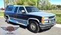 1994 Blue /Blue Chevrolet C/K 1500 Ext. Cab 6.5-ft. Bed 4WD (1GCEK19K5RE) with an 5.7L V8 OHV 16V engine, 5 Speed Manual transmission, located at 450 N Russell, Missoula, MT, 59801, (406) 543-6600, 46.874496, -114.017433 - 4WD. Extended Cab. 5.7L V8. 5 Speed Manual Transmission. Air. Cruise. Tilt. Power Windows and Locks. Matching Topper. Paint is a little rough and and a couple rust spots. Lots of miles but runs amazing. Because of the age our Lenders do not offer financing on this vehicle. - Photo#1