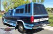 1994 Blue /Blue Chevrolet C/K 1500 Ext. Cab 6.5-ft. Bed 4WD (1GCEK19K5RE) with an 5.7L V8 OHV 16V engine, 5 Speed Manual transmission, located at 450 N Russell, Missoula, MT, 59801, (406) 543-6600, 46.874496, -114.017433 - 4WD. Extended Cab. 5.7L V8. 5 Speed Manual Transmission. Air. Cruise. Tilt. Power Windows and Locks. Matching Topper. Paint is a little rough and and a couple rust spots. Lots of miles but runs amazing. Because of the age our Lenders do not offer financing on this vehicle. - Photo#3