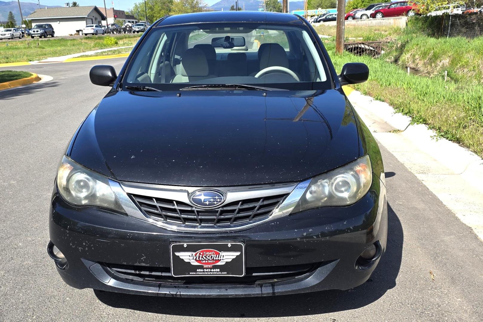 2008 Black /Black Subaru Impreza 2.5i (JF1GE61628G) with an 2.5L H4 SOHC 16V engine, 5 Speed Manual transmission, located at 450 N Russell, Missoula, MT, 59801, (406) 543-6600, 46.874496, -114.017433 - 2.5L H4 Engine. 5 Speed Manual Transmission. Air. Cruise. Tilt. Power Windows and Locks. Tires are like new. - Photo#4