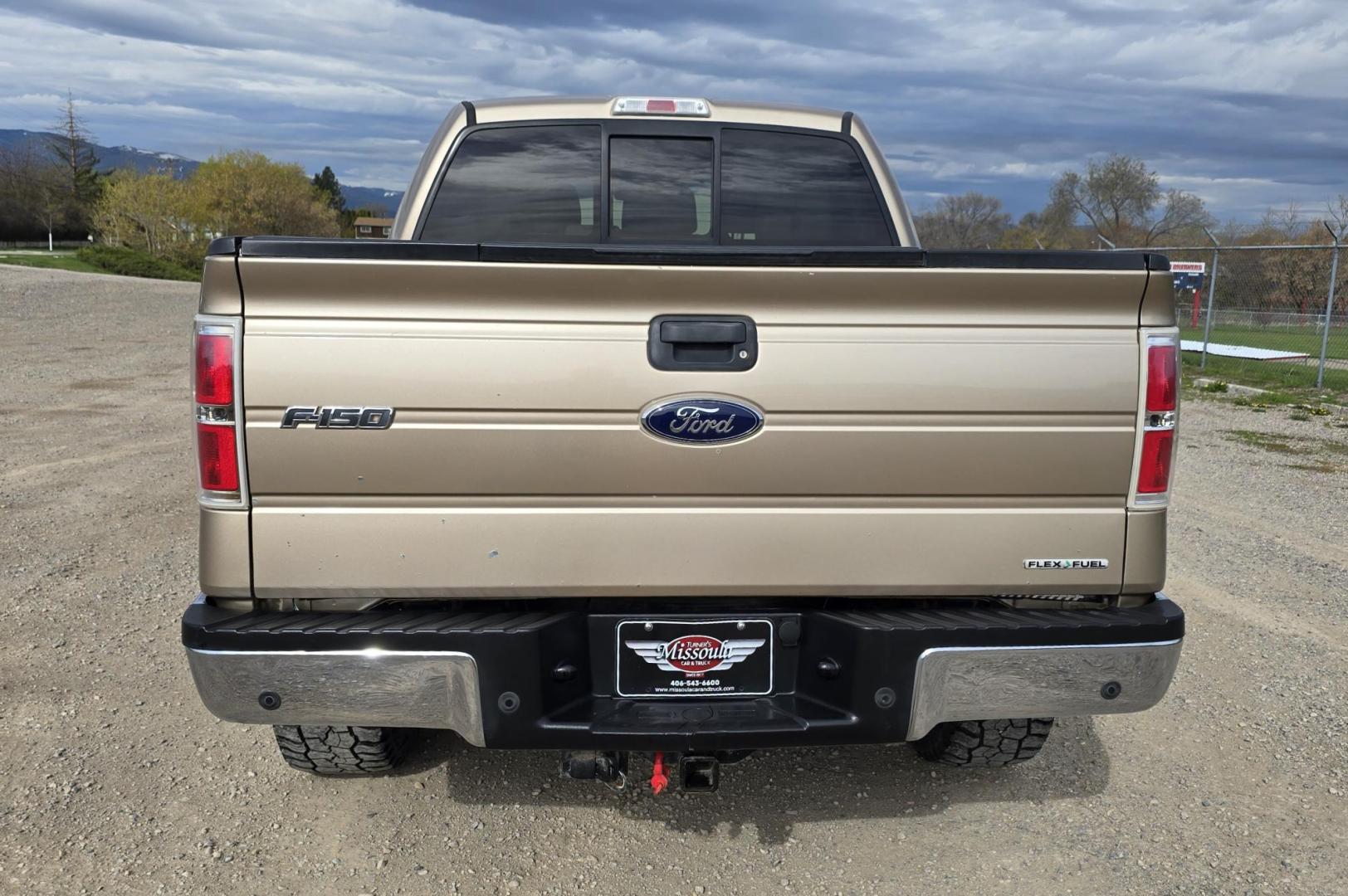 2011 Gold /Tan Ford F-150 FX4 SuperCrew 5.5-ft. Bed 4WD (1FTFW1EF6BK) with an 5.0L V8 engine, 4-Speed Automatic transmission, located at 450 N Russell, Missoula, MT, 59801, (406) 543-6600, 46.874496, -114.017433 - Mechanic's Special. Very Good physical condition. Runs pretty well but does have a miss. Mechanic says it has a bad valve which means pulling the head. I don't want to spend the money so you have a chance to own a really nice truck for less. 4WD works great. Air Blows Cold. Power Windows and locks. - Photo#6