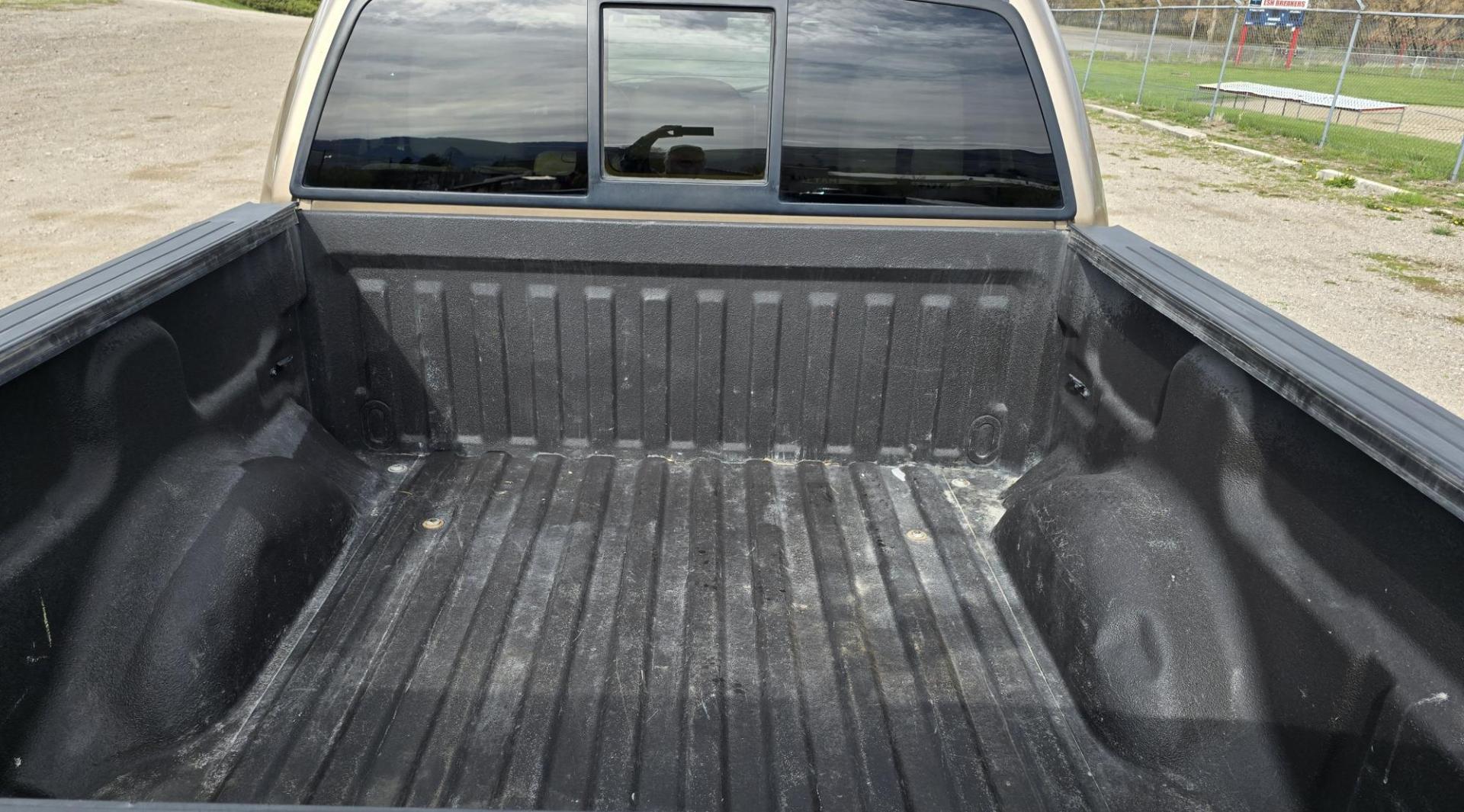 2011 Gold /Tan Ford F-150 FX4 SuperCrew 5.5-ft. Bed 4WD (1FTFW1EF6BK) with an 5.0L V8 engine, 4-Speed Automatic transmission, located at 450 N Russell, Missoula, MT, 59801, (406) 543-6600, 46.874496, -114.017433 - Mechanic's Special. Very Good physical condition. Runs pretty well but does have a miss. Mechanic says it has a bad valve which means pulling the head. I don't want to spend the money so you have a chance to own a really nice truck for less. 4WD works great. Air Blows Cold. Power Windows and locks. - Photo#8