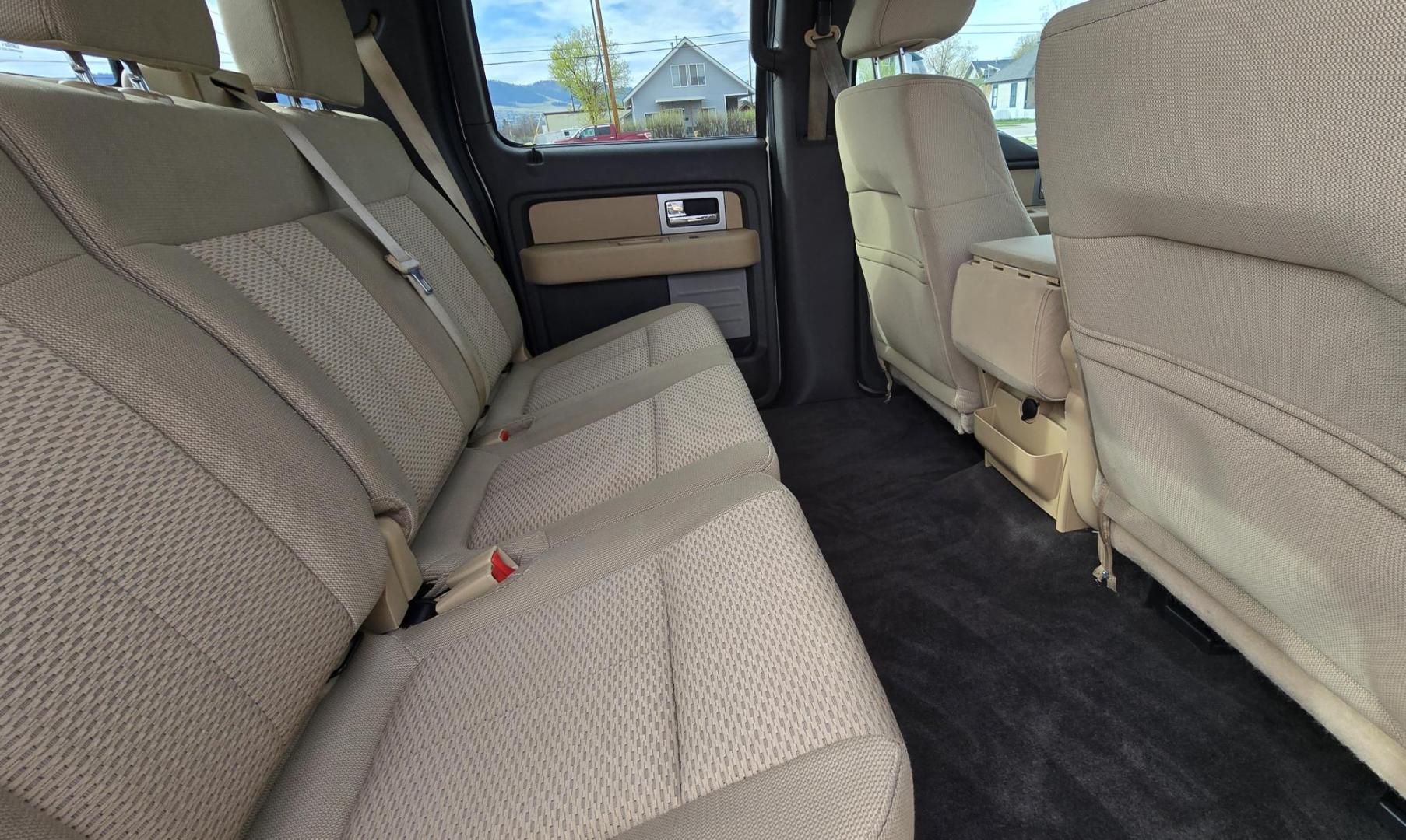 2011 Gold /Tan Ford F-150 FX4 SuperCrew 5.5-ft. Bed 4WD (1FTFW1EF6BK) with an 5.0L V8 engine, 4-Speed Automatic transmission, located at 450 N Russell, Missoula, MT, 59801, (406) 543-6600, 46.874496, -114.017433 - Mechanic's Special. Very Good physical condition. Runs pretty well but does have a miss. Mechanic says it has a bad valve which means pulling the head. I don't want to spend the money so you have a chance to own a really nice truck for less. 4WD works great. Air Blows Cold. Power Windows and locks. - Photo#12