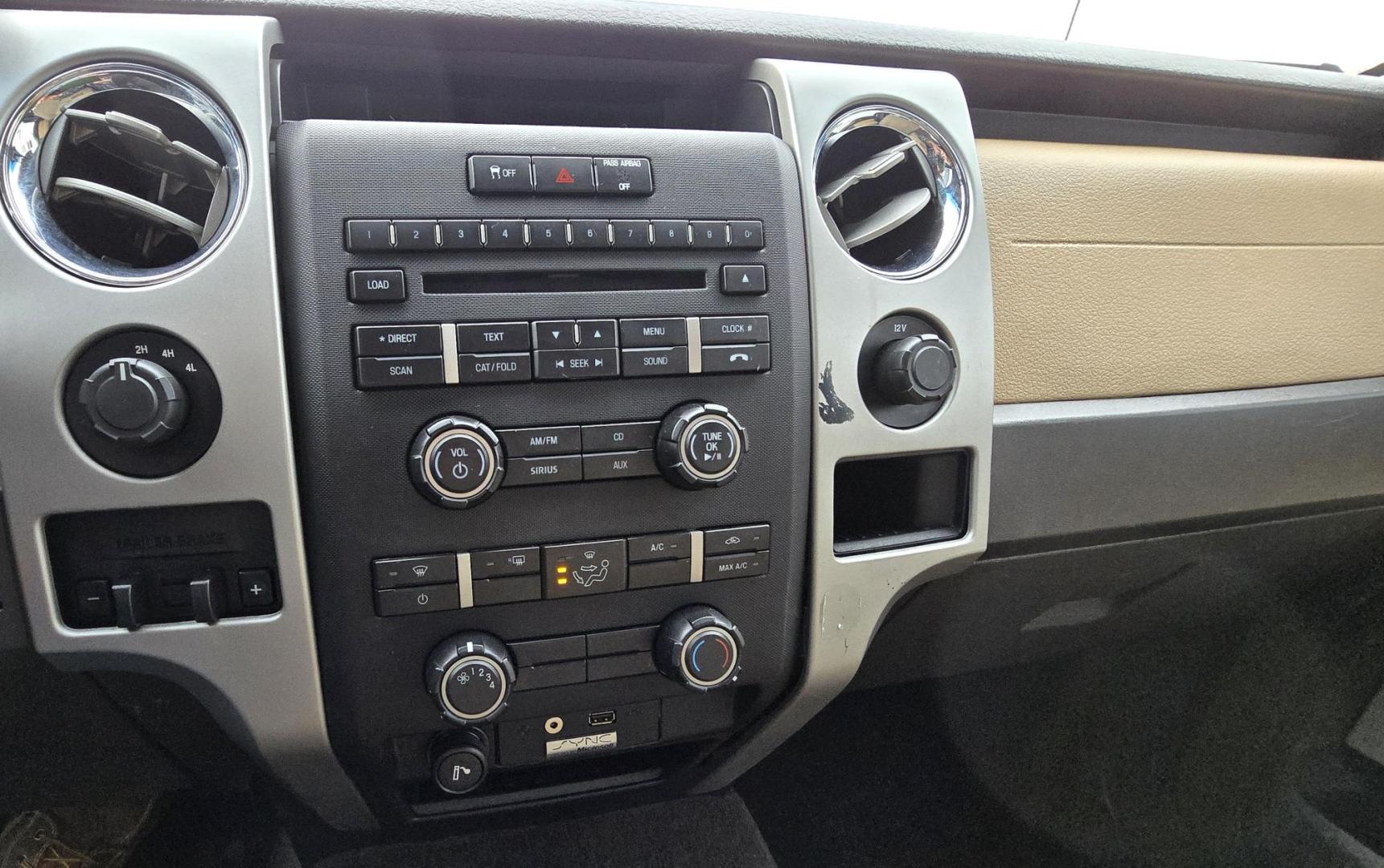 2011 Gold /Tan Ford F-150 FX4 SuperCrew 5.5-ft. Bed 4WD (1FTFW1EF6BK) with an 5.0L V8 engine, 4-Speed Automatic transmission, located at 450 N Russell, Missoula, MT, 59801, (406) 543-6600, 46.874496, -114.017433 - Mechanic's Special. Very Good physical condition. Runs pretty well but does have a miss. Mechanic says it has a bad valve which means pulling the head. I don't want to spend the money so you have a chance to own a really nice truck for less. 4WD works great. Air Blows Cold. Power Windows and locks. - Photo#15
