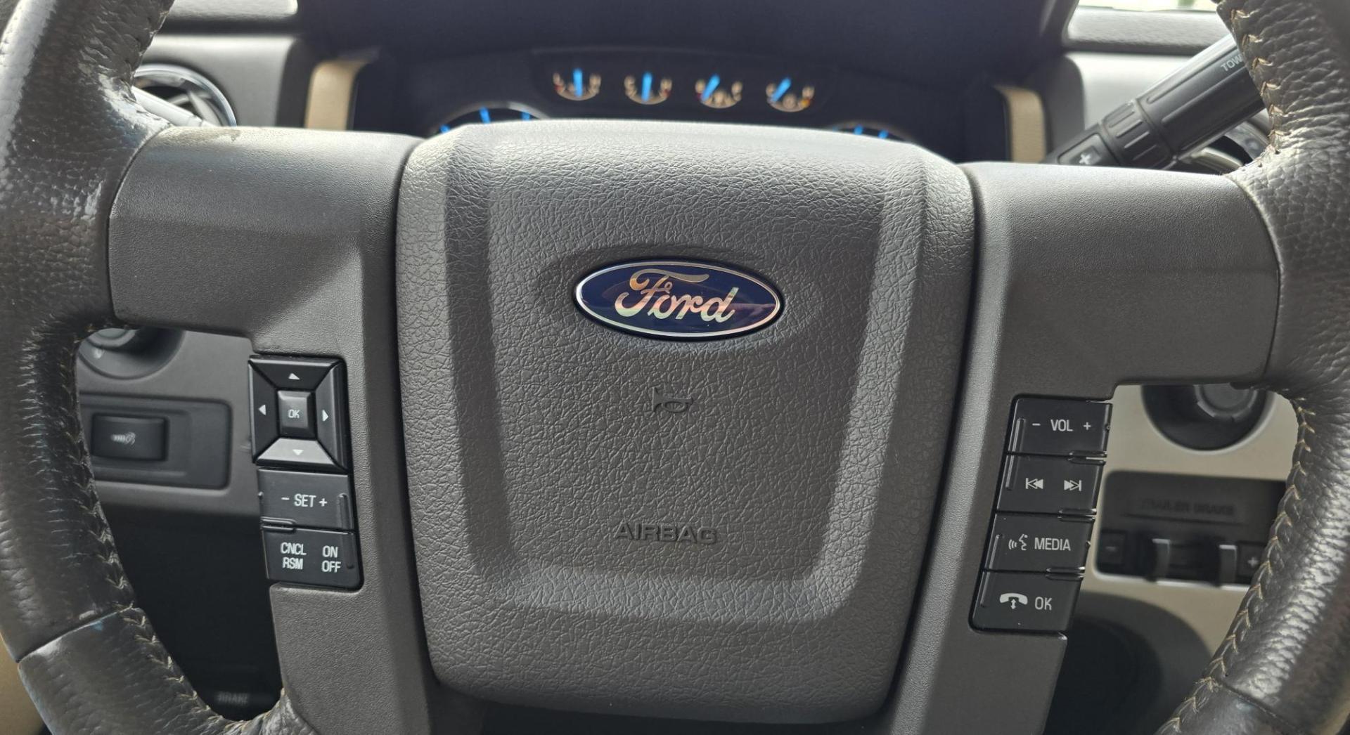 2011 Gold /Tan Ford F-150 FX4 SuperCrew 5.5-ft. Bed 4WD (1FTFW1EF6BK) with an 5.0L V8 engine, 4-Speed Automatic transmission, located at 450 N Russell, Missoula, MT, 59801, (406) 543-6600, 46.874496, -114.017433 - Mechanic's Special. Very Good physical condition. Runs pretty well but does have a miss. Mechanic says it has a bad valve which means pulling the head. I don't want to spend the money so you have a chance to own a really nice truck for less. 4WD works great. Air Blows Cold. Power Windows and locks. - Photo#16