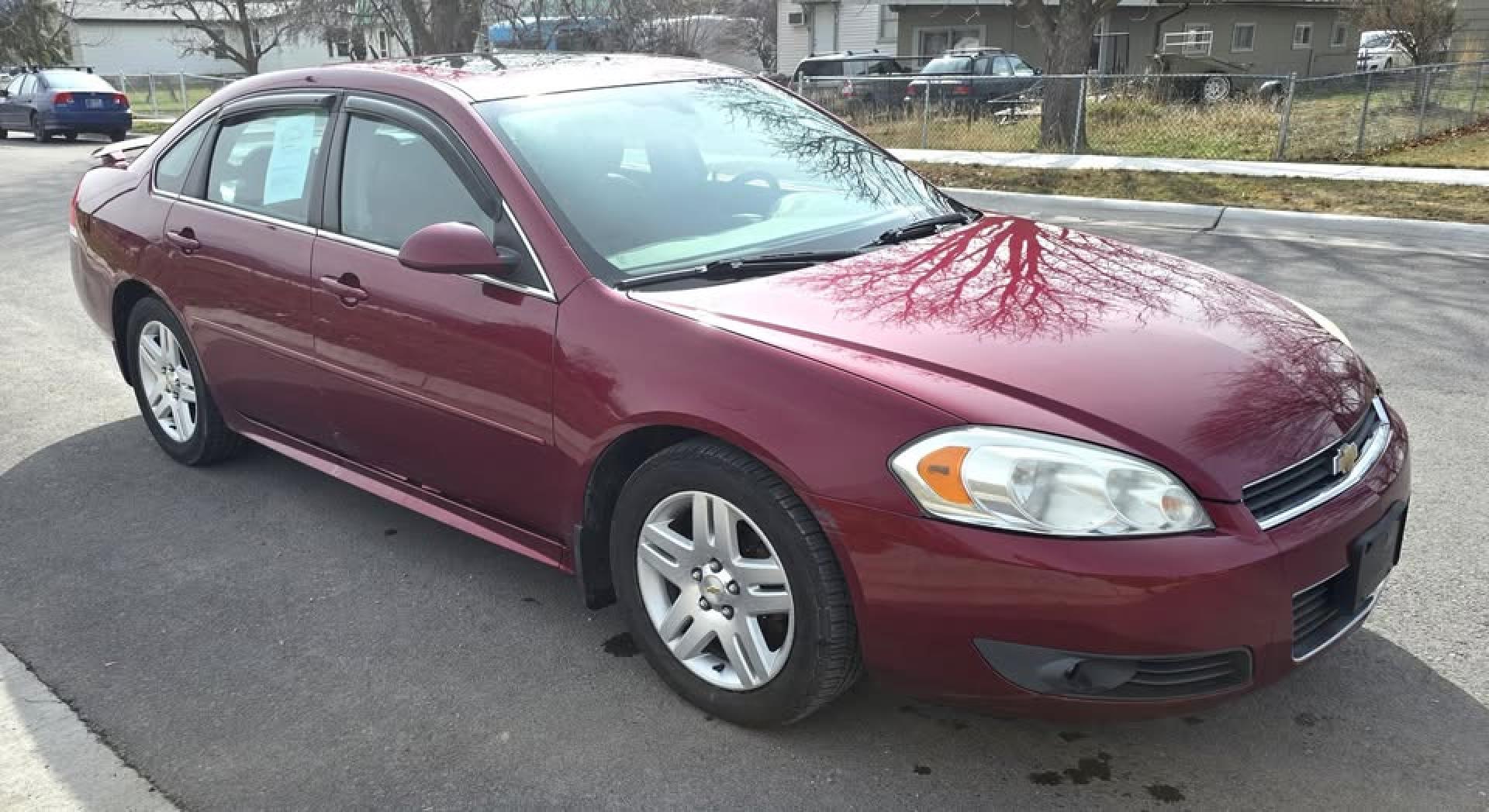 2010 Red /Black Chevrolet Impala LT (2G1WB5EN4A1) with an 3.5L V6 OHV 12V engine, 4-Speed Automatic transmission, located at 450 N Russell, Missoula, MT, 59801, (406) 543-6600, 46.874496, -114.017433 - This Chevy Impala runs amazing and everything works. If it didn't have rust, we would price this much higher. 3.5L V6 Engine. Air. Cruise. Tilt. Power Sunroof. Heated Leather Seats. Remote Start. Power Windows and Locks. AM FM SAT CD Player. Clean Title and Carfax. - Photo#2