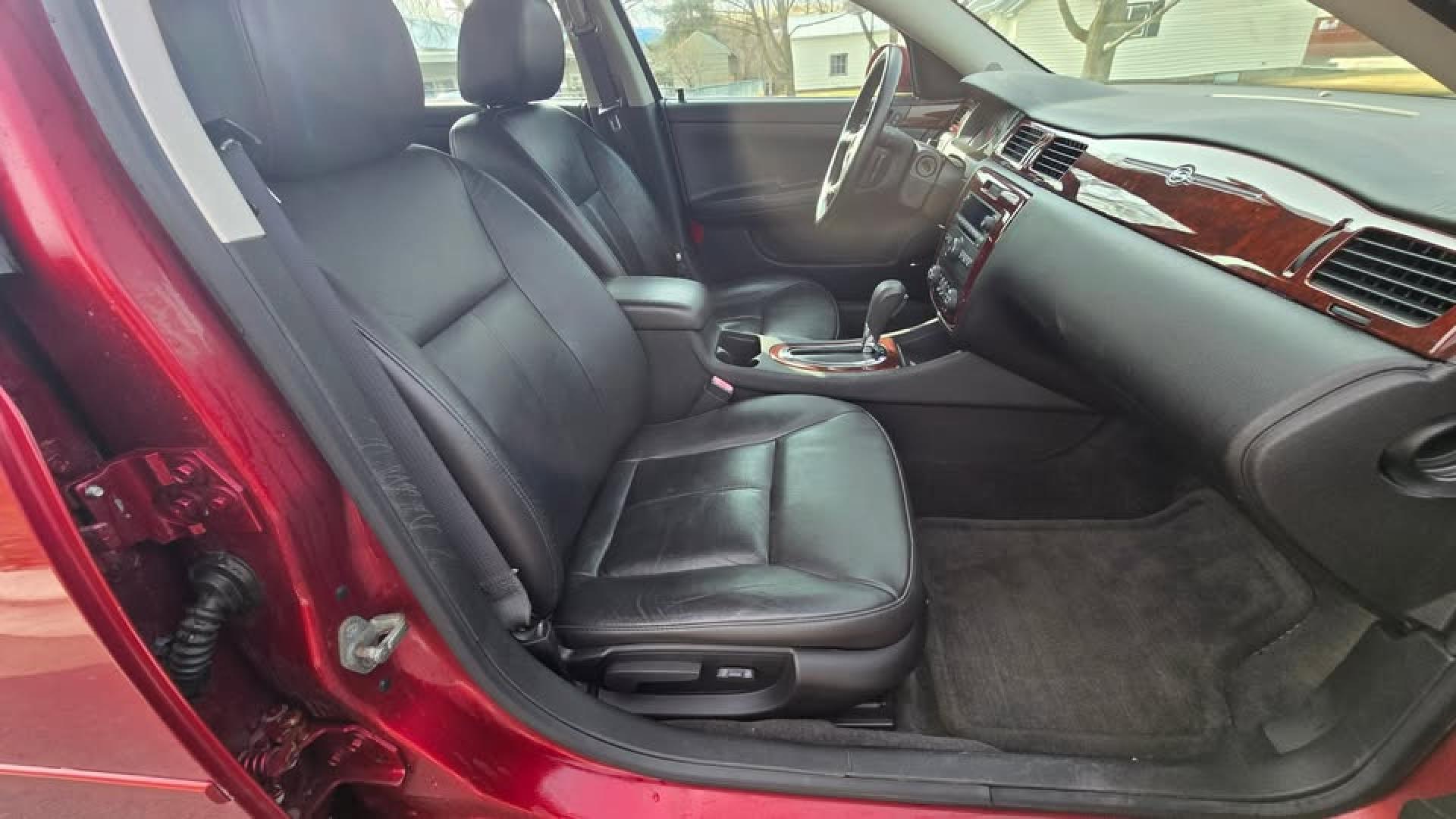2010 Red /Black Chevrolet Impala LT (2G1WB5EN4A1) with an 3.5L V6 OHV 12V engine, 4-Speed Automatic transmission, located at 450 N Russell, Missoula, MT, 59801, (406) 543-6600, 46.874496, -114.017433 - This Chevy Impala runs amazing and everything works. If it didn't have rust, we would price this much higher. 3.5L V6 Engine. Air. Cruise. Tilt. Power Sunroof. Heated Leather Seats. Remote Start. Power Windows and Locks. AM FM SAT CD Player. Clean Title and Carfax. - Photo#13