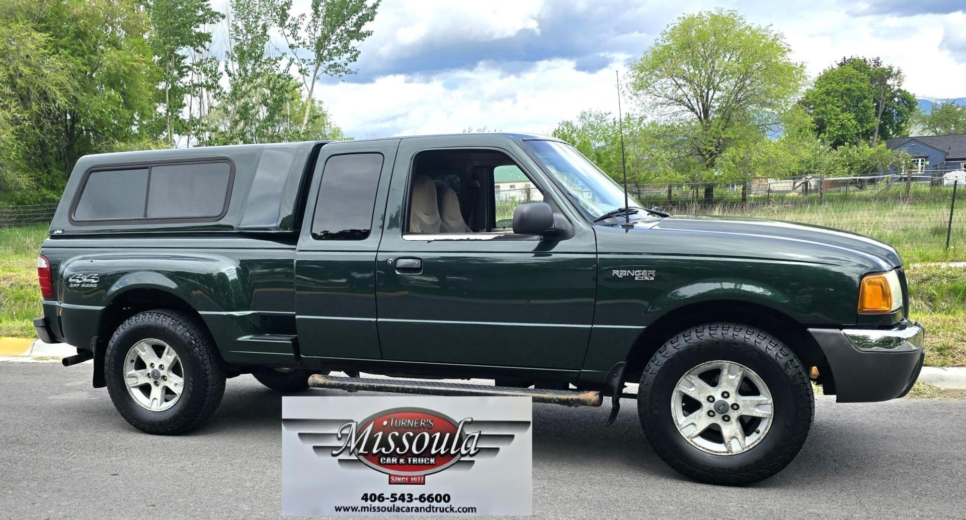 2002 Green /Black Ford Ranger Edge Plus SuperCab 4WD (1FTZR45E92P) with an 4.0L V6 SOHC 12V engine, 5-Speed Automatic Overdrive transmission, located at 450 N Russell, Missoula, MT, 59801, (406) 543-6600, 46.874496, -114.017433 - Hard to come by smaller 4WD Truck. 4.0L V6 Engine. Automatic Transmission. Nice Matching Topper. Air. Cruise. Tilt. Power Windows and Locks. AM FM CD Player. Towing. Running Board. Engine is Strong and Body is Straight. Paint has a few blemishes. Because of the age, financing is not available th - Photo#1