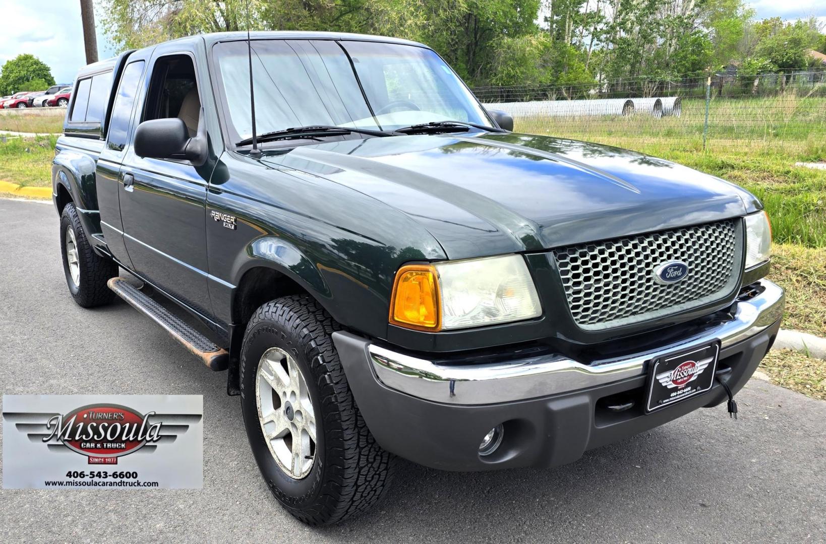 2002 Green /Black Ford Ranger Edge Plus SuperCab 4WD (1FTZR45E92P) with an 4.0L V6 SOHC 12V engine, 5-Speed Automatic Overdrive transmission, located at 450 N Russell, Missoula, MT, 59801, (406) 543-6600, 46.874496, -114.017433 - Hard to come by smaller 4WD Truck. 4.0L V6 Engine. Automatic Transmission. Nice Matching Topper. Air. Cruise. Tilt. Power Windows and Locks. AM FM CD Player. Towing. Running Board. Engine is Strong and Body is Straight. Paint has a few blemishes. Because of the age, financing is not available th - Photo#3