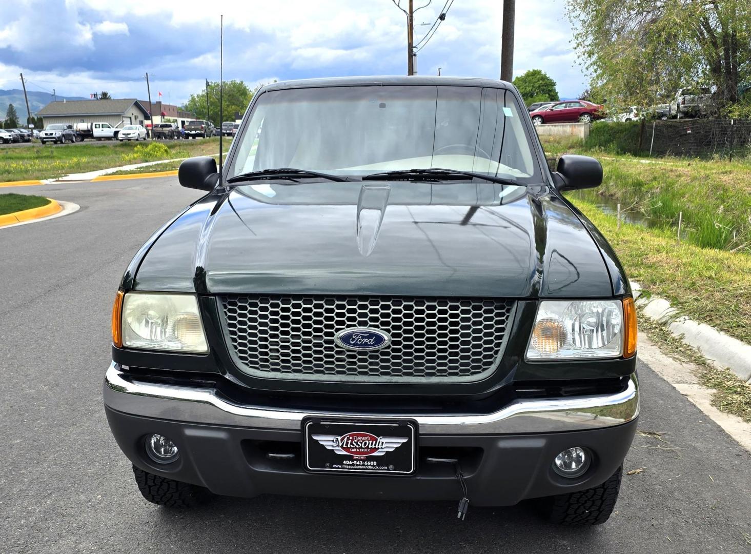 2002 Green /Black Ford Ranger Edge Plus SuperCab 4WD (1FTZR45E92P) with an 4.0L V6 SOHC 12V engine, 5-Speed Automatic Overdrive transmission, located at 450 N Russell, Missoula, MT, 59801, (406) 543-6600, 46.874496, -114.017433 - Hard to come by smaller 4WD Truck. 4.0L V6 Engine. Automatic Transmission. Nice Matching Topper. Air. Cruise. Tilt. Power Windows and Locks. AM FM CD Player. Towing. Running Board. Engine is Strong and Body is Straight. Paint has a few blemishes. Because of the age, financing is not available th - Photo#4